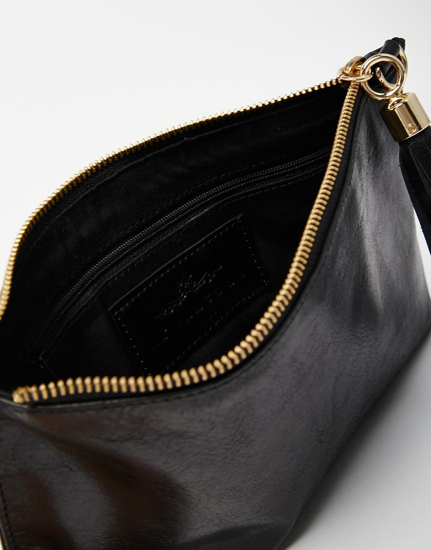 black leather clutch bag