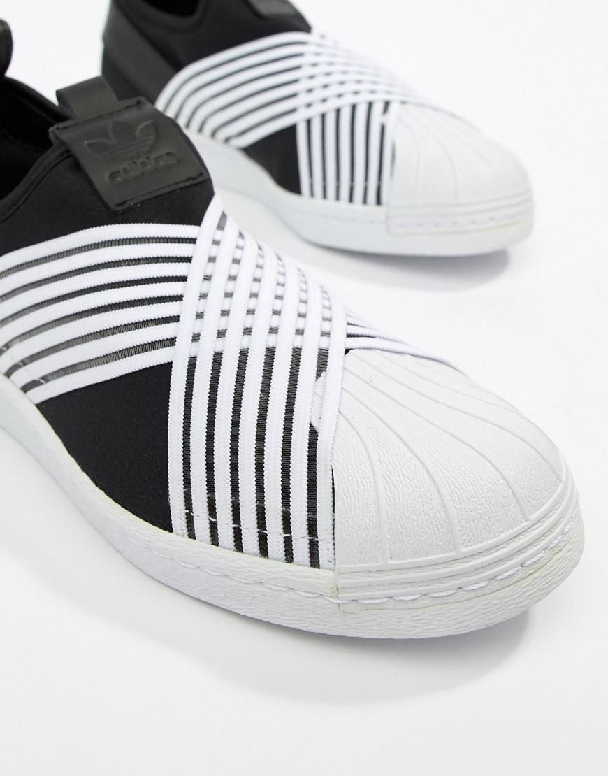 adidas originals superstar slip on trainers in black and white