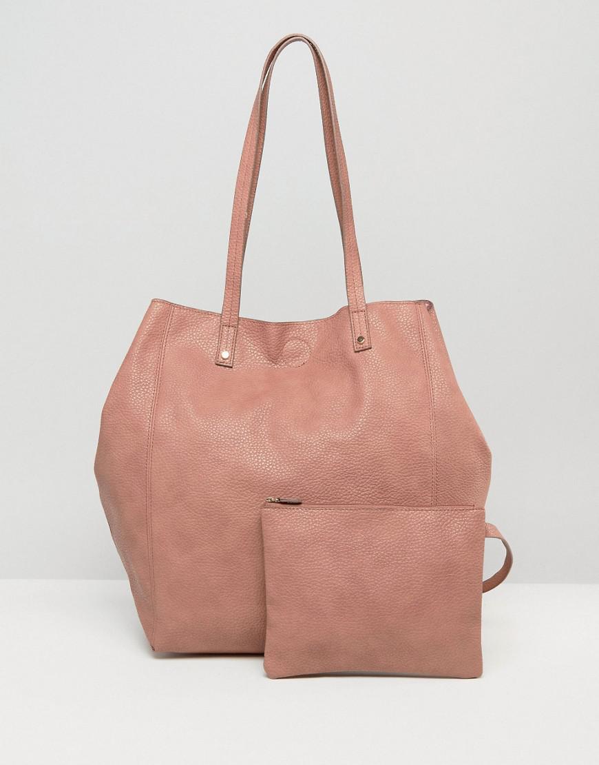 Lyst Asos Soft Per Bag With Removable Clutch In Pink Gallery Women S Per Bags