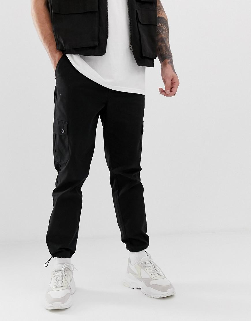 ASOS Tapered Cargo Pants In Black With toggles in Black for Men - Lyst