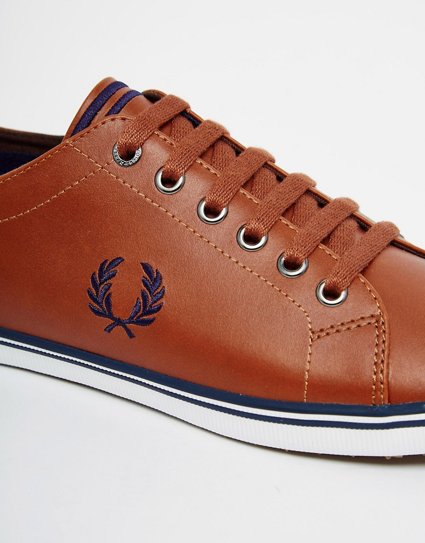 Shop by category Step out in style with our range of mens canvas shoes and plimsolls. These lightweight pumps are ideal for everyday wear and perfect with a pair of shorts for a week in the sun.