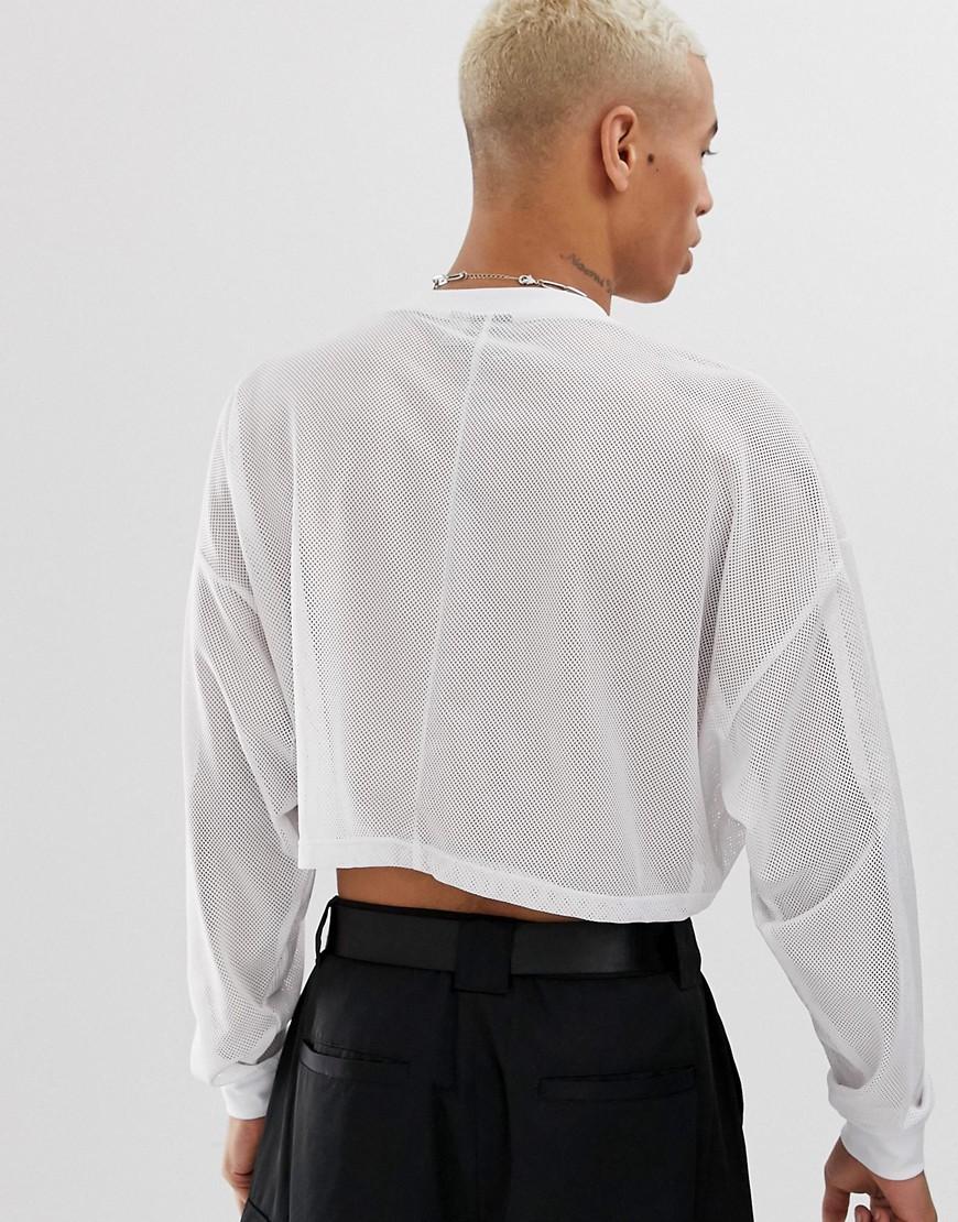 tight white cropped long sleeve shirt