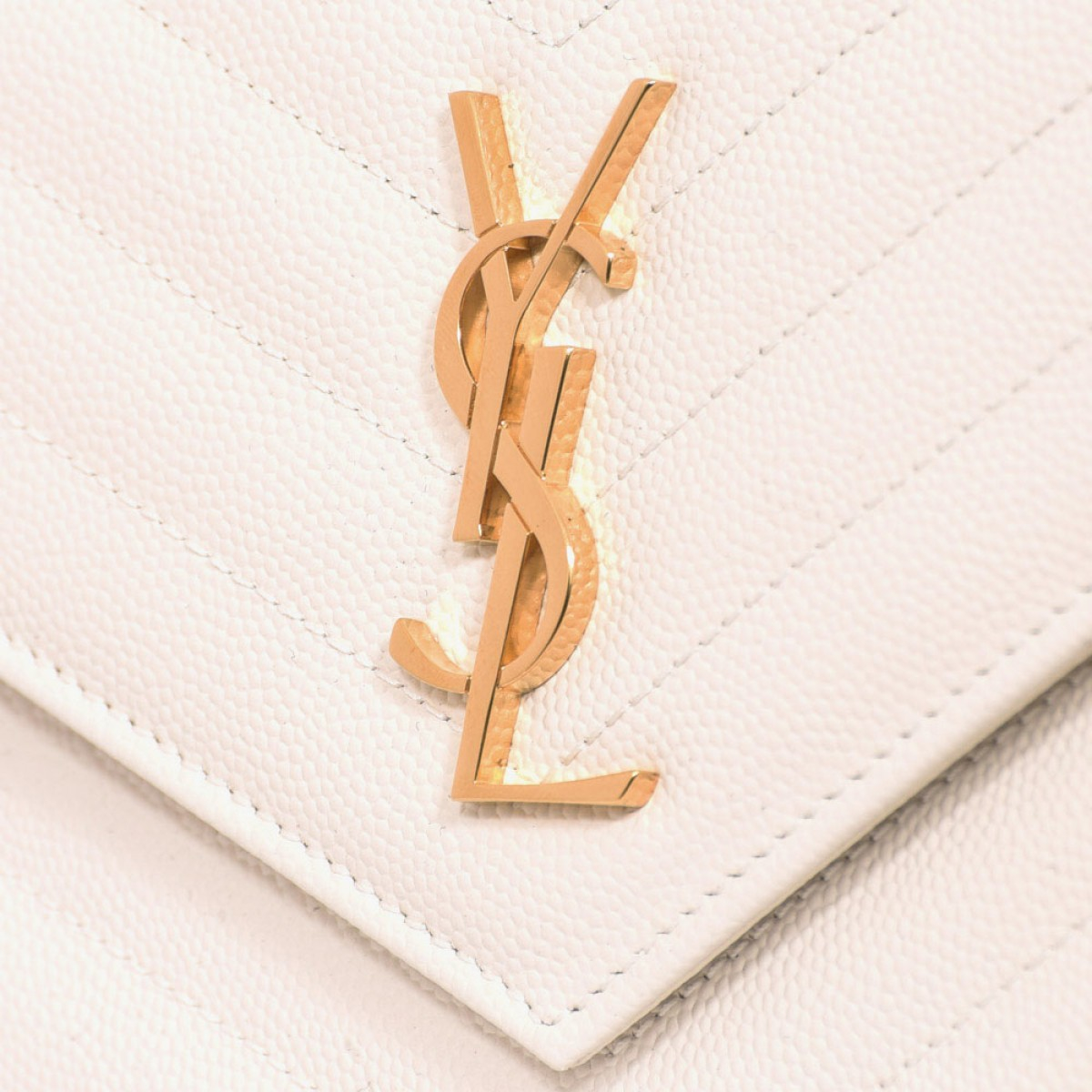 chain wallet in pink and white textured matelassé leather