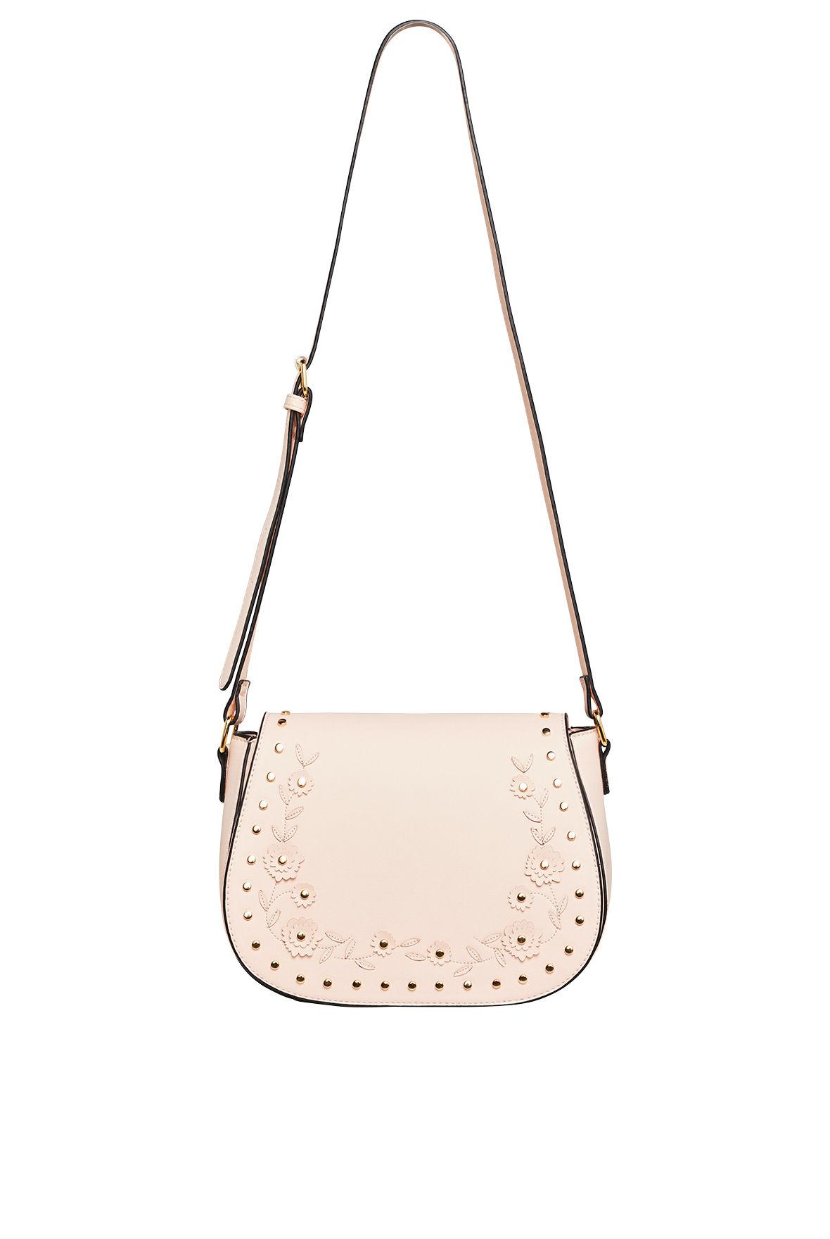 Lyst Bcbgeneration Mikayla Faux Leather Saddle Bag In Pink Bcbgeneration
