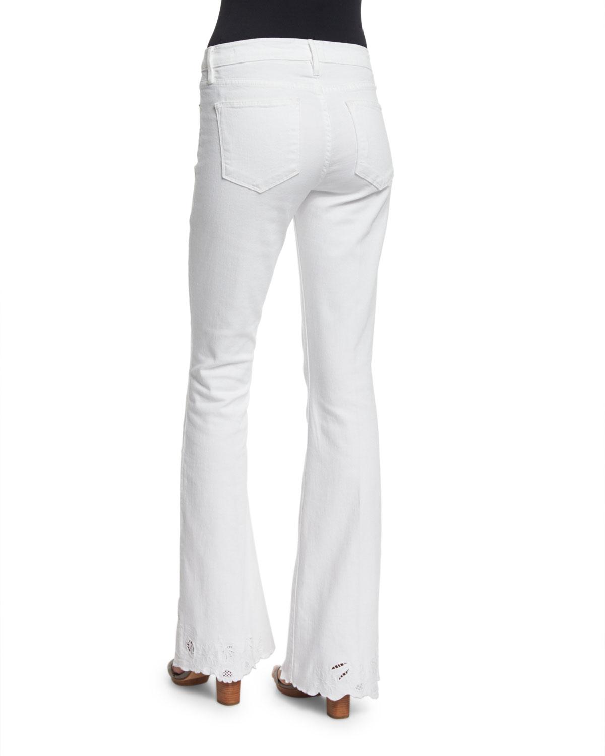 white flare leg jeans