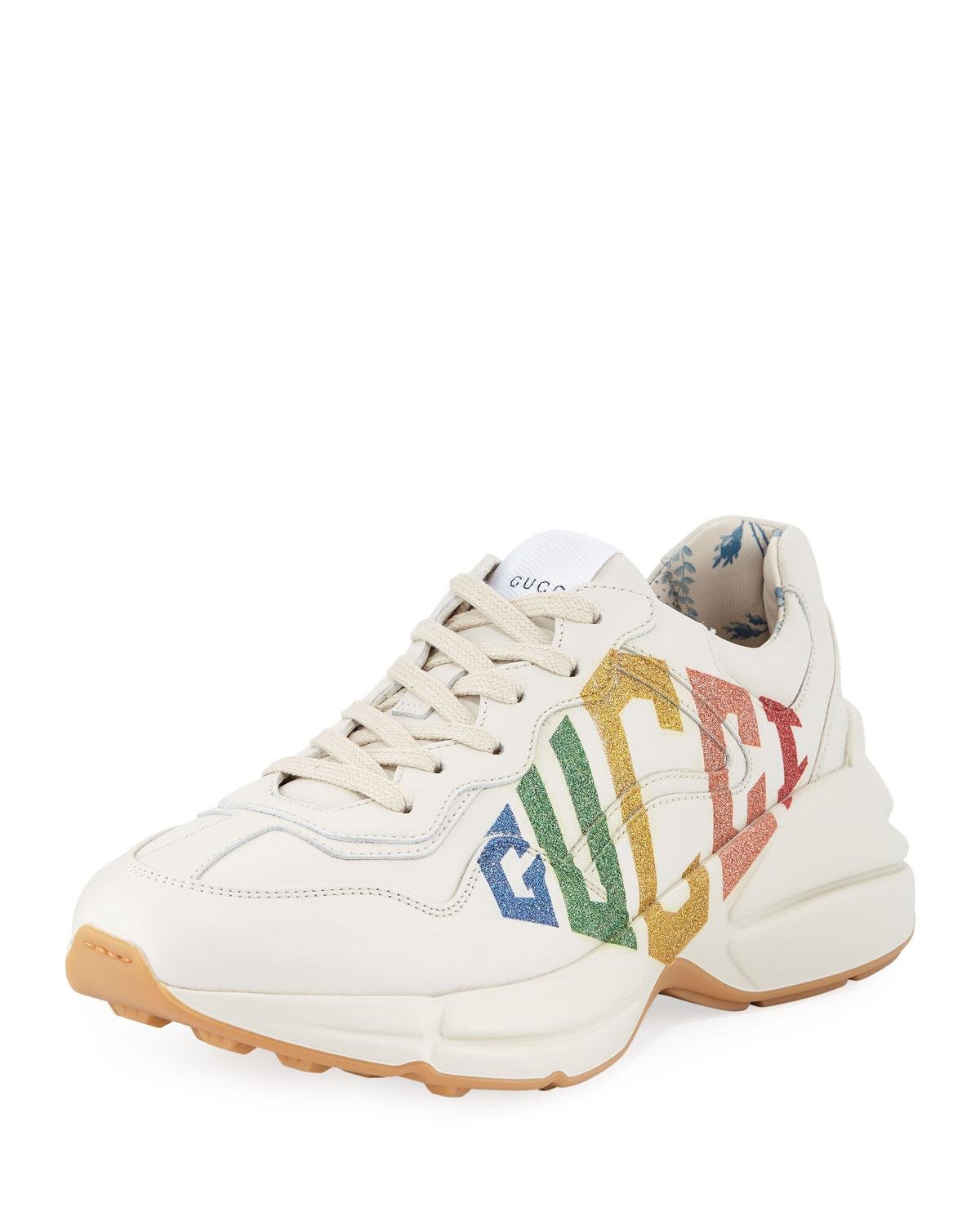 white rhyton gucci logo trainers
