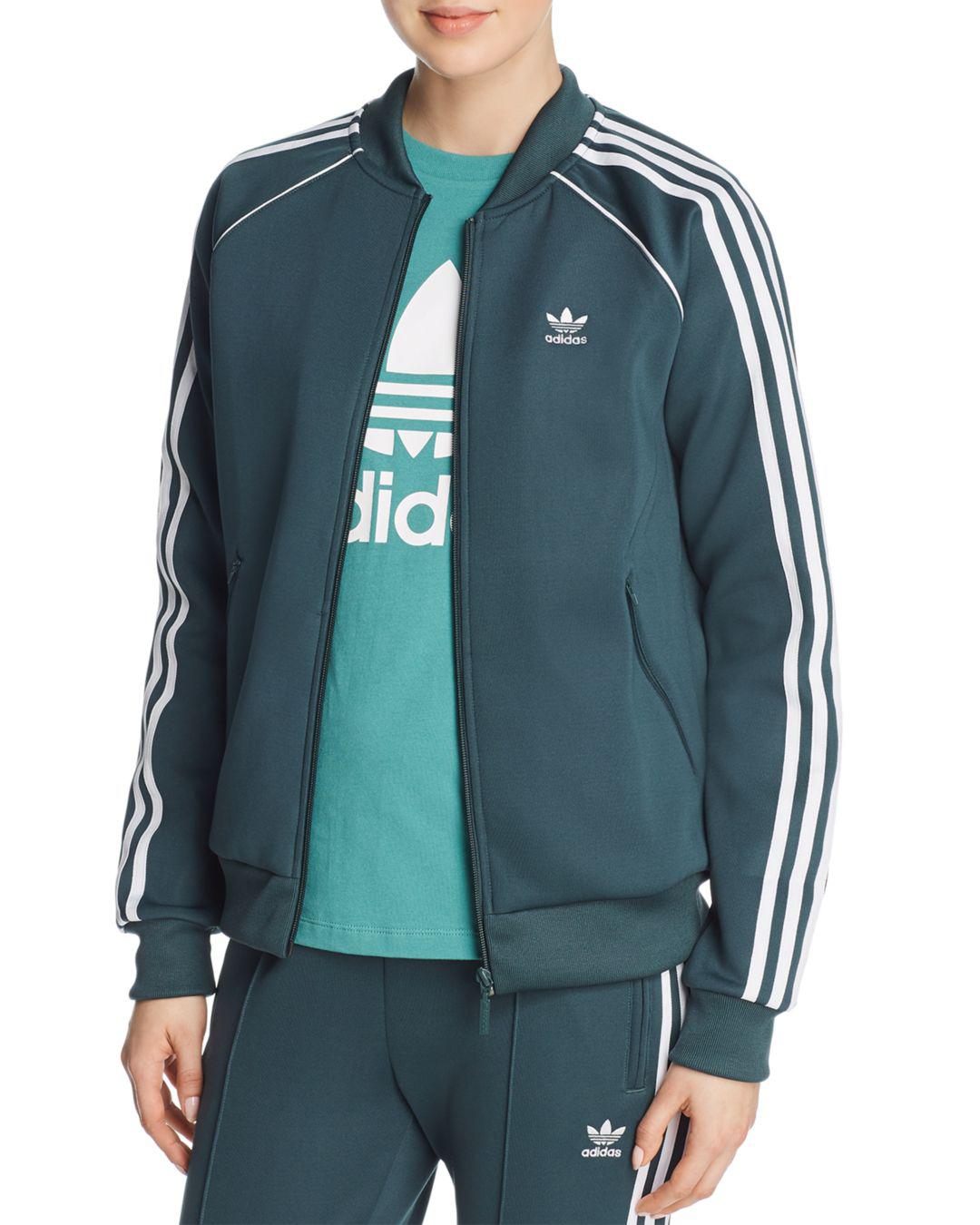 adidas jacket black with green stripes