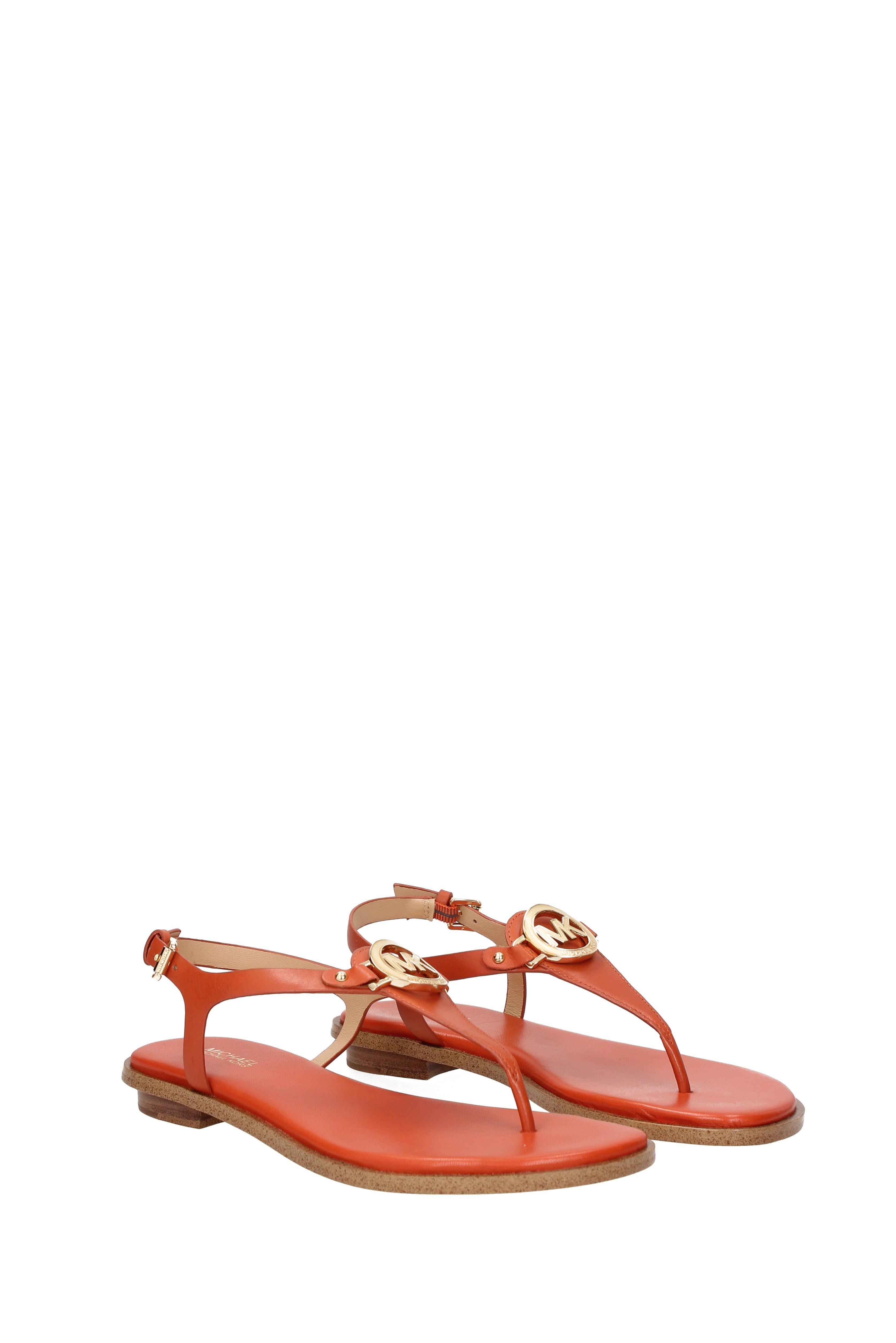 ladies orange flip flops