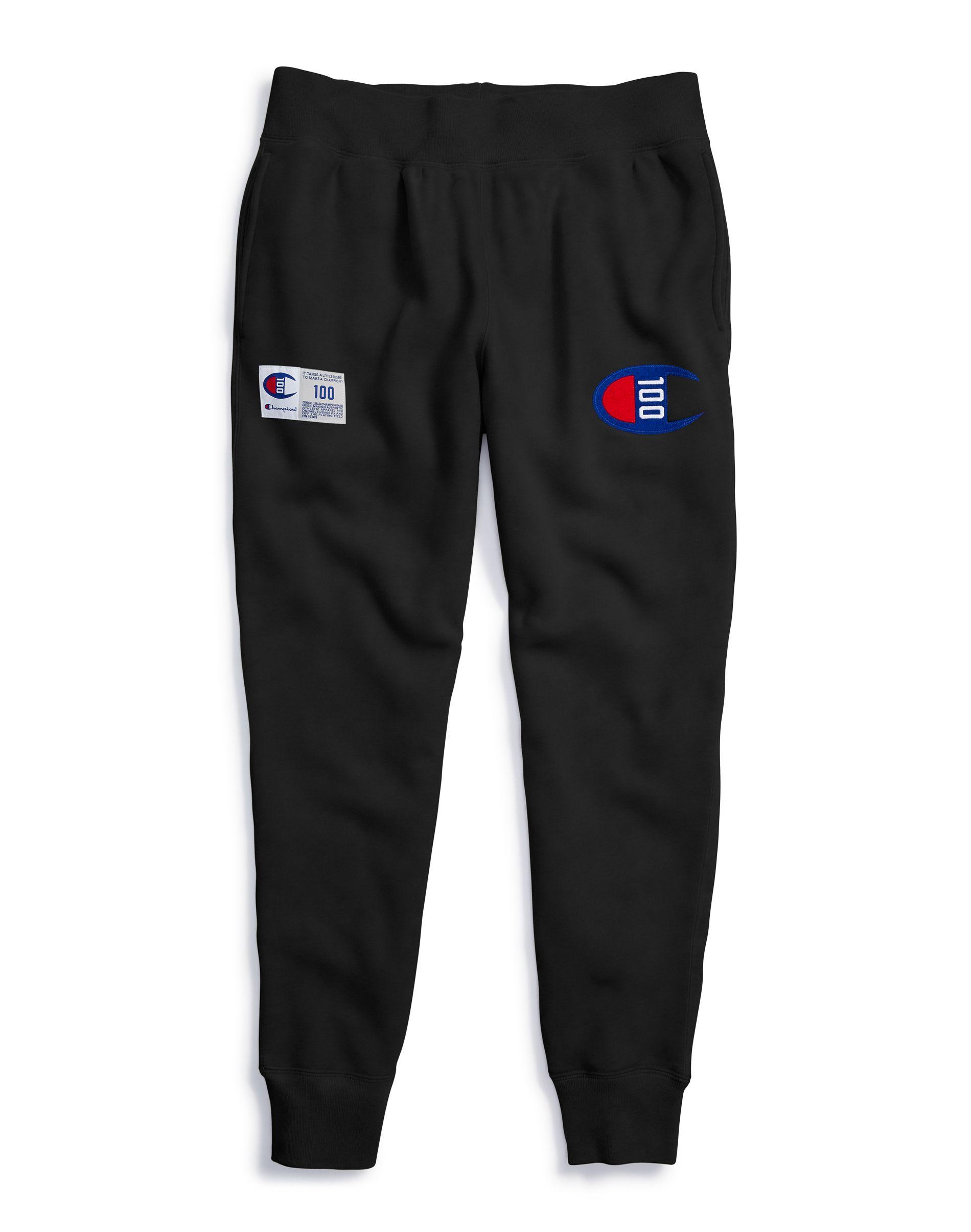 champion joggers logo all over