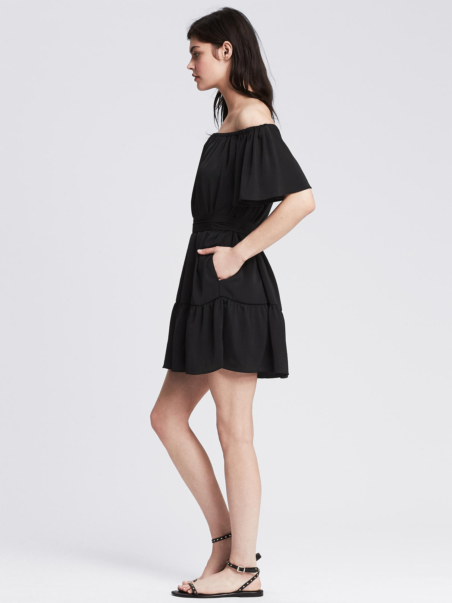 black off the shoulder dress with ruffles