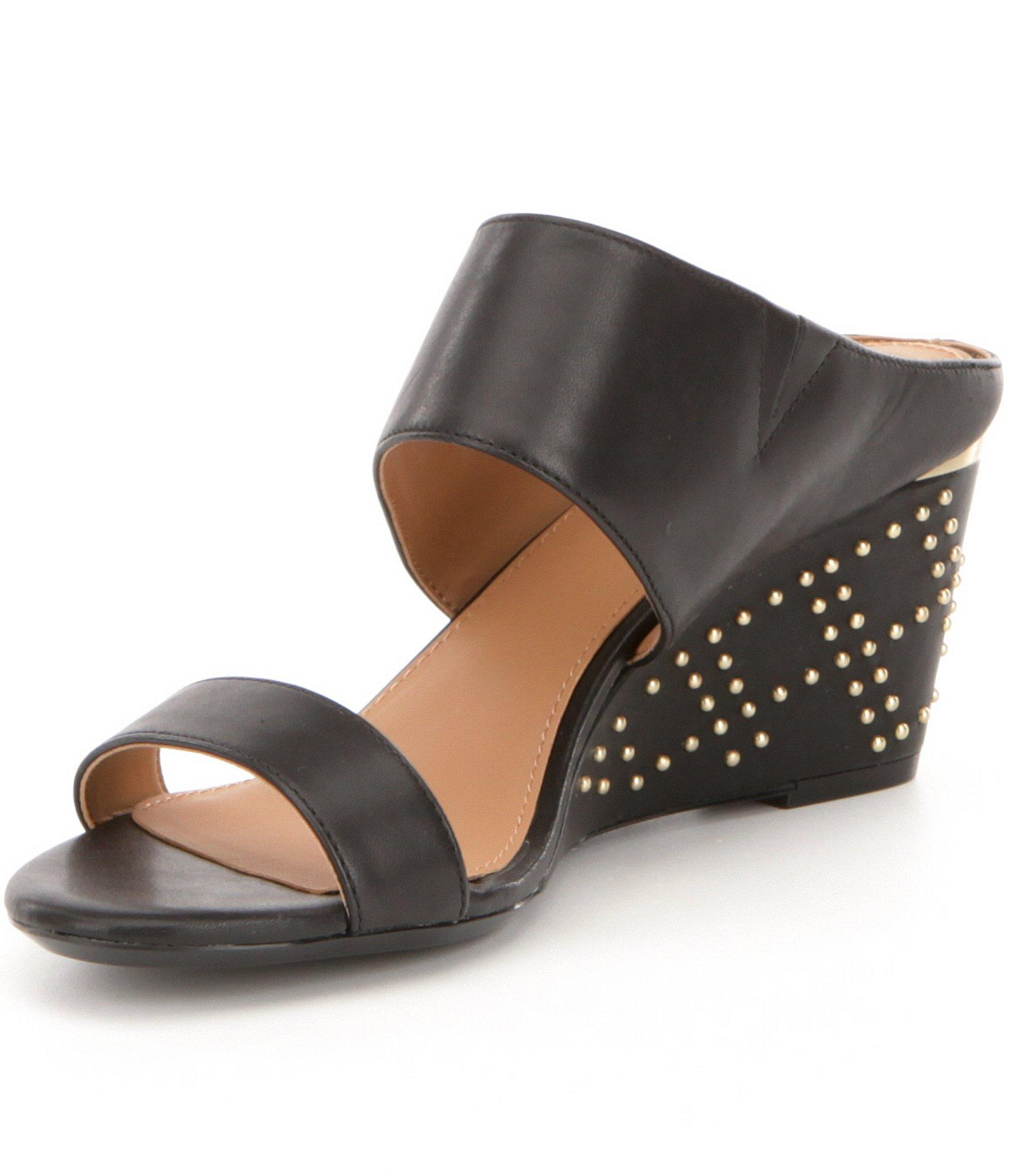 Lyst - Calvin Klein Phyllis Studded Leather Wedge Sandals in Black