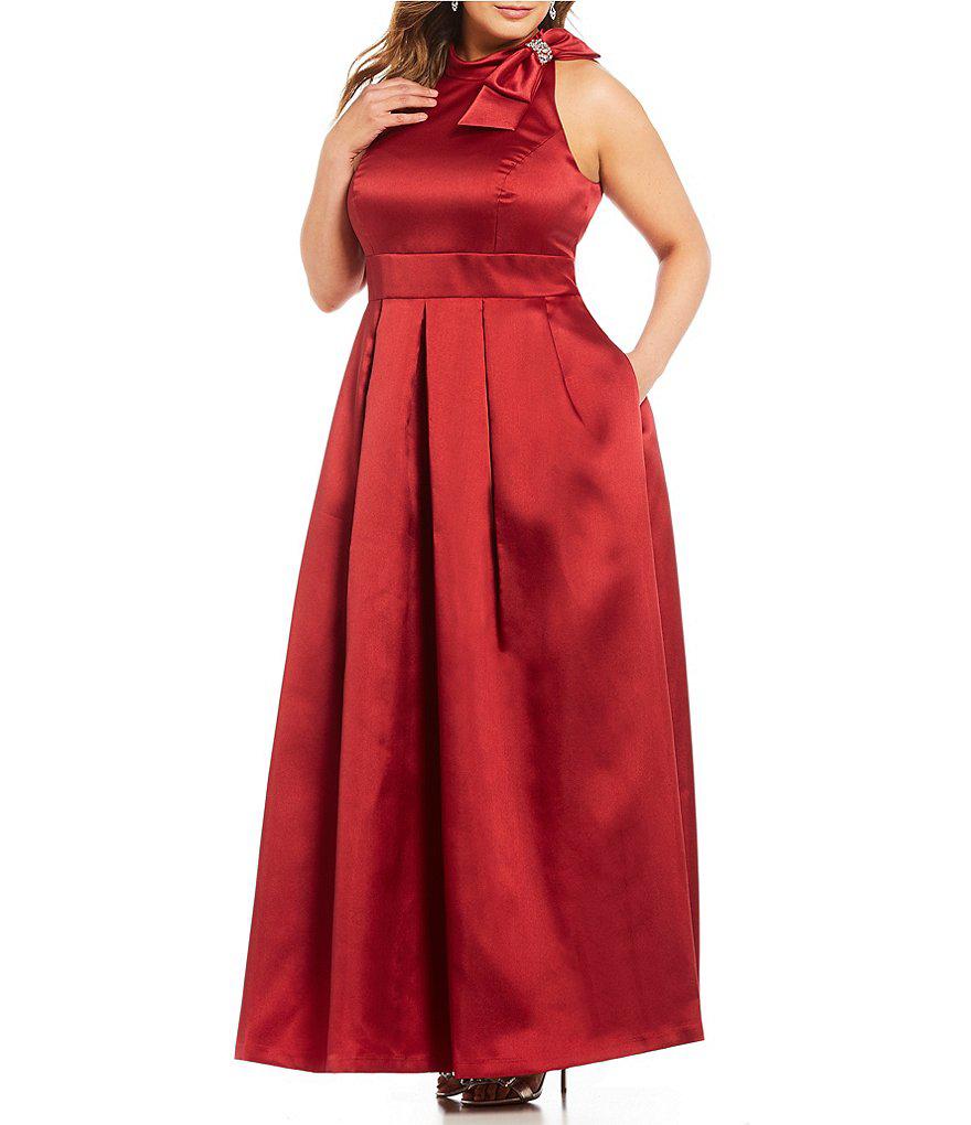 https://www.dillards.com/p/eliza-j-plus-bow-neck-ballgown/507407472?di=05142957_zi_red&categoryId=3100&facetCache=pageSize%3D96%26beginIndex%3D96%26orderBy%3D1