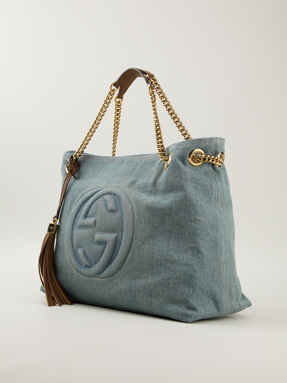 gucci denim duffle bag