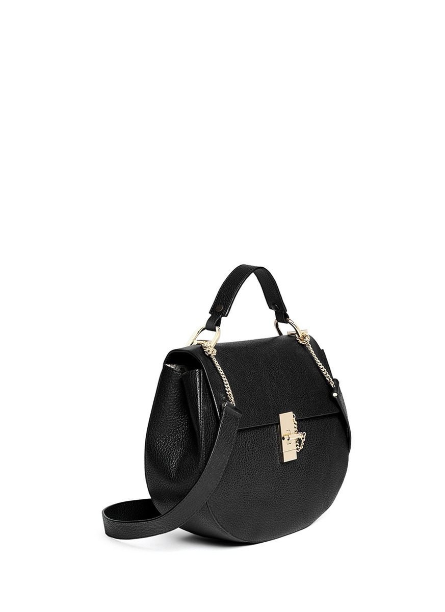 raven medium pebbled leather shoulder bag