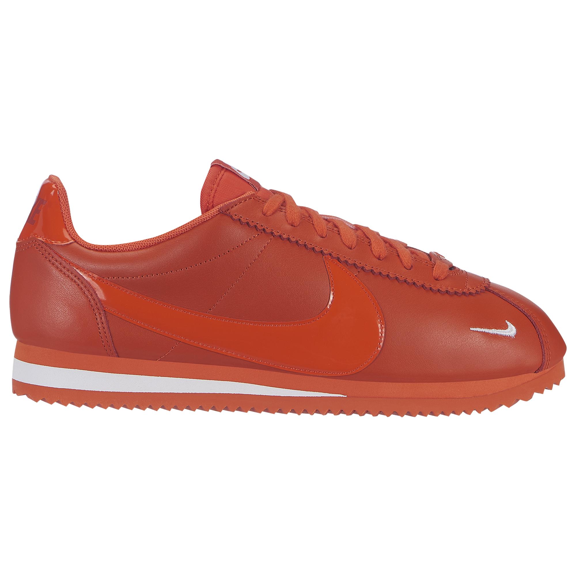 nike cortez white orange