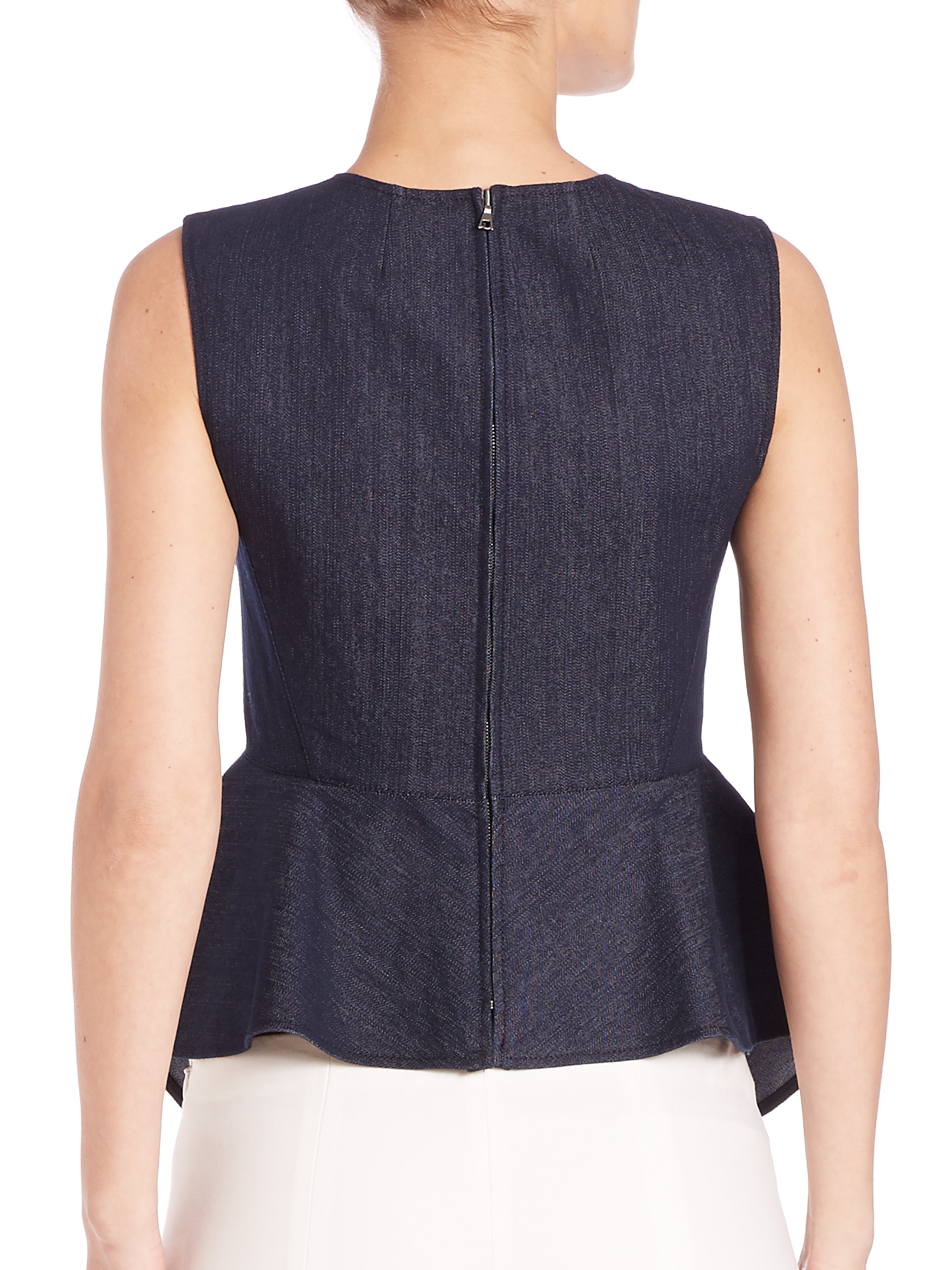 Denim peplum shirt A classic denim top with a trendy twist, this double-tiered peplum style is a serious score. From Joan Rivers Classics Collection®. Page /5(17).