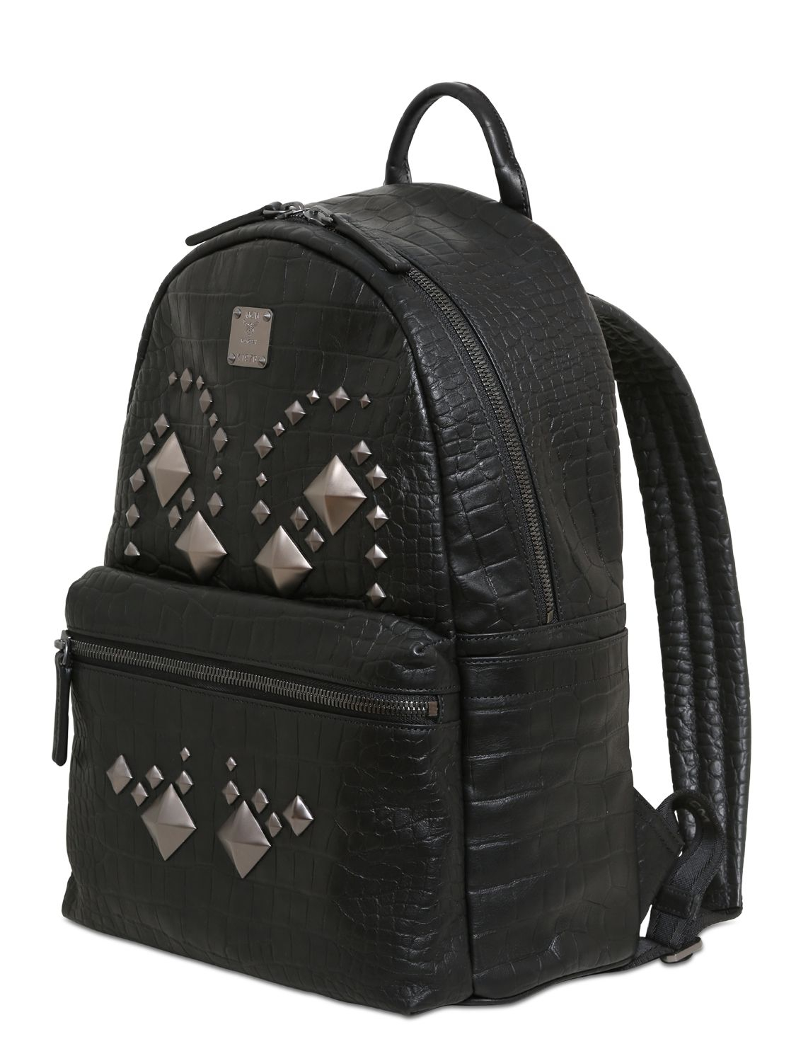 Mcm Medium Star Embossed Leather Backpack in Black for Men Lyst