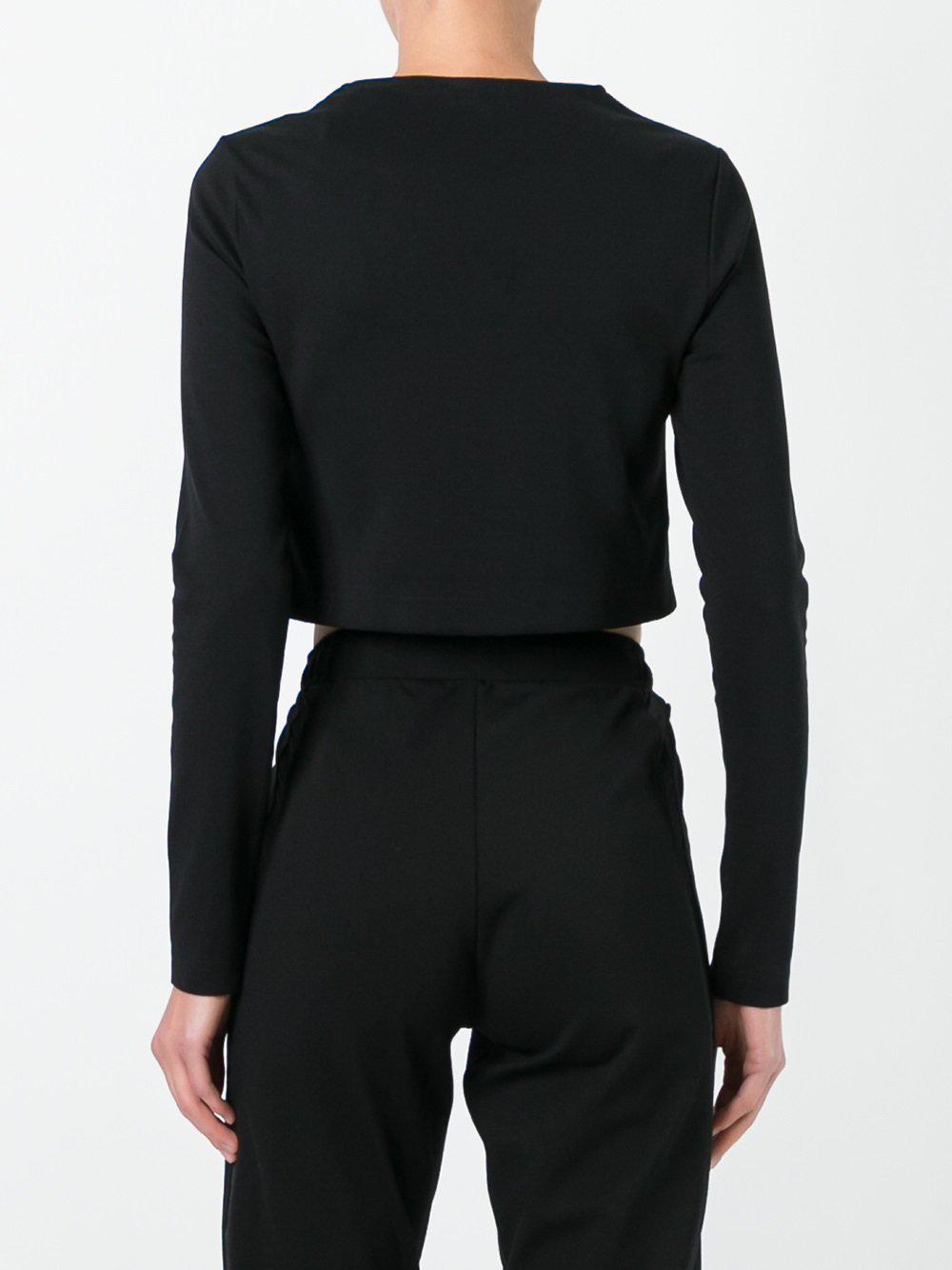 black sweatshirt and jeans