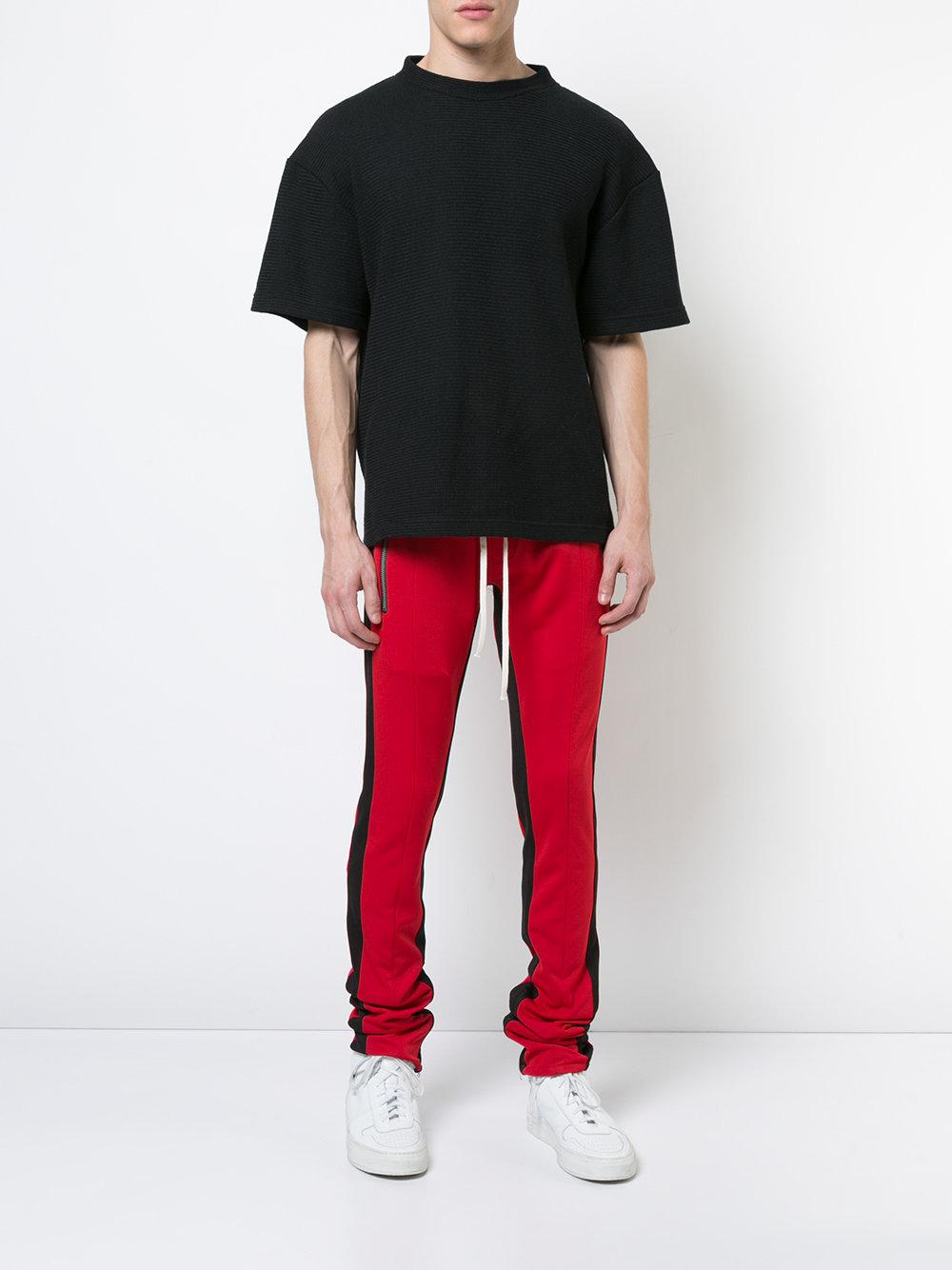 fear of god track pants black red