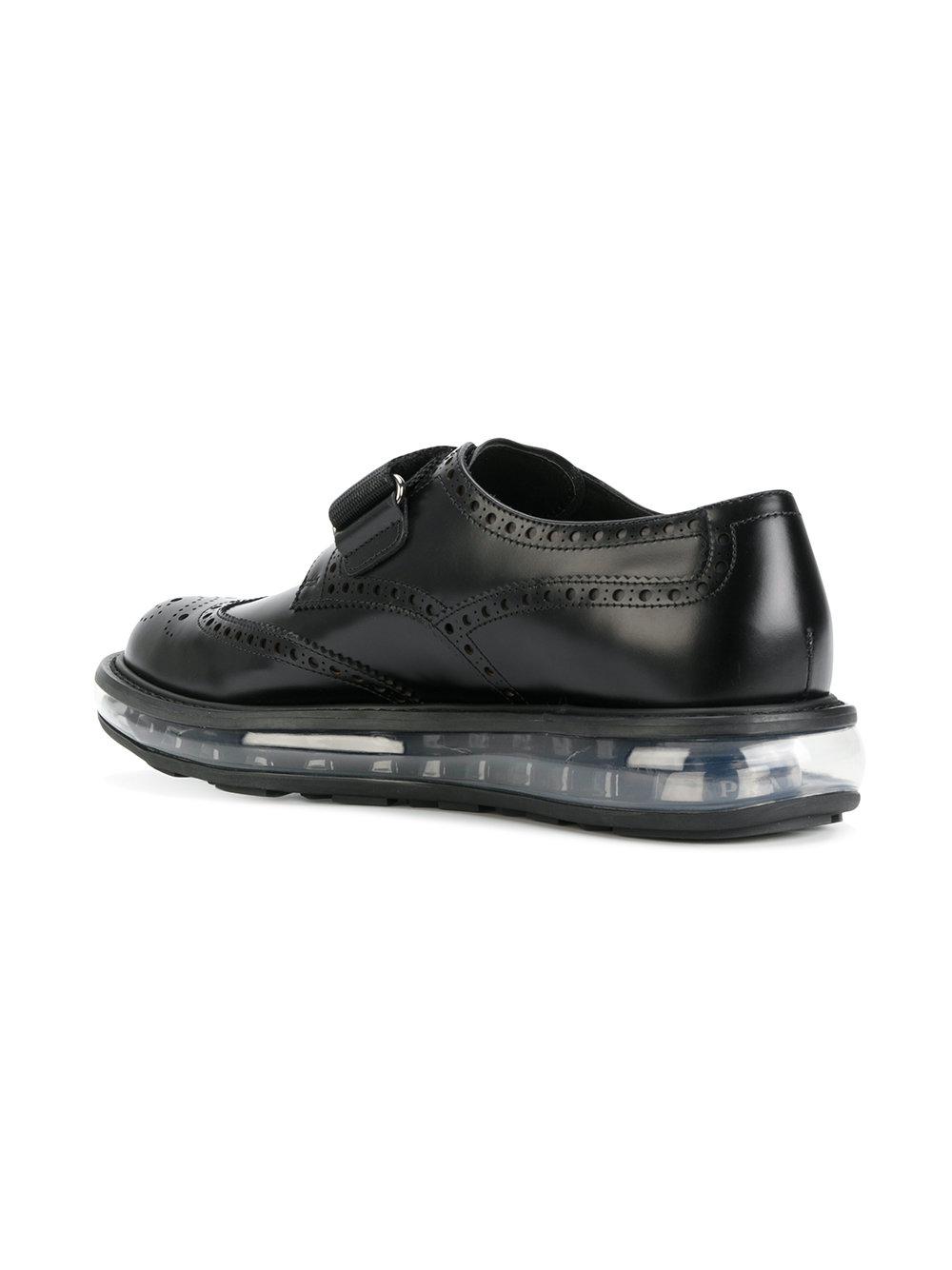 prada wingtip sneakers