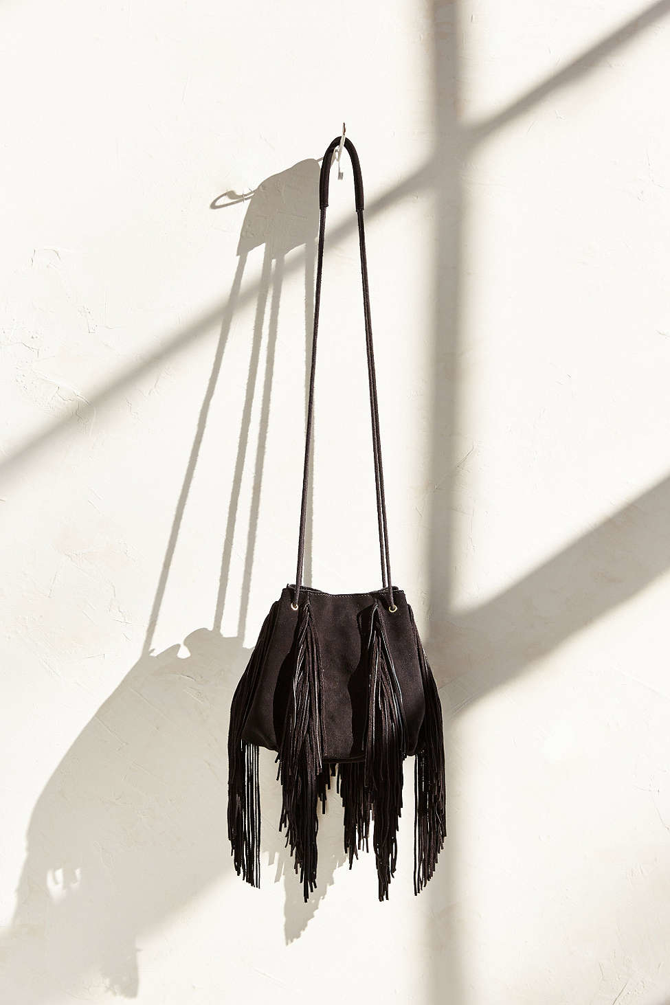 Lyst Ecote Fringe Bucket Bag In Black Gallery