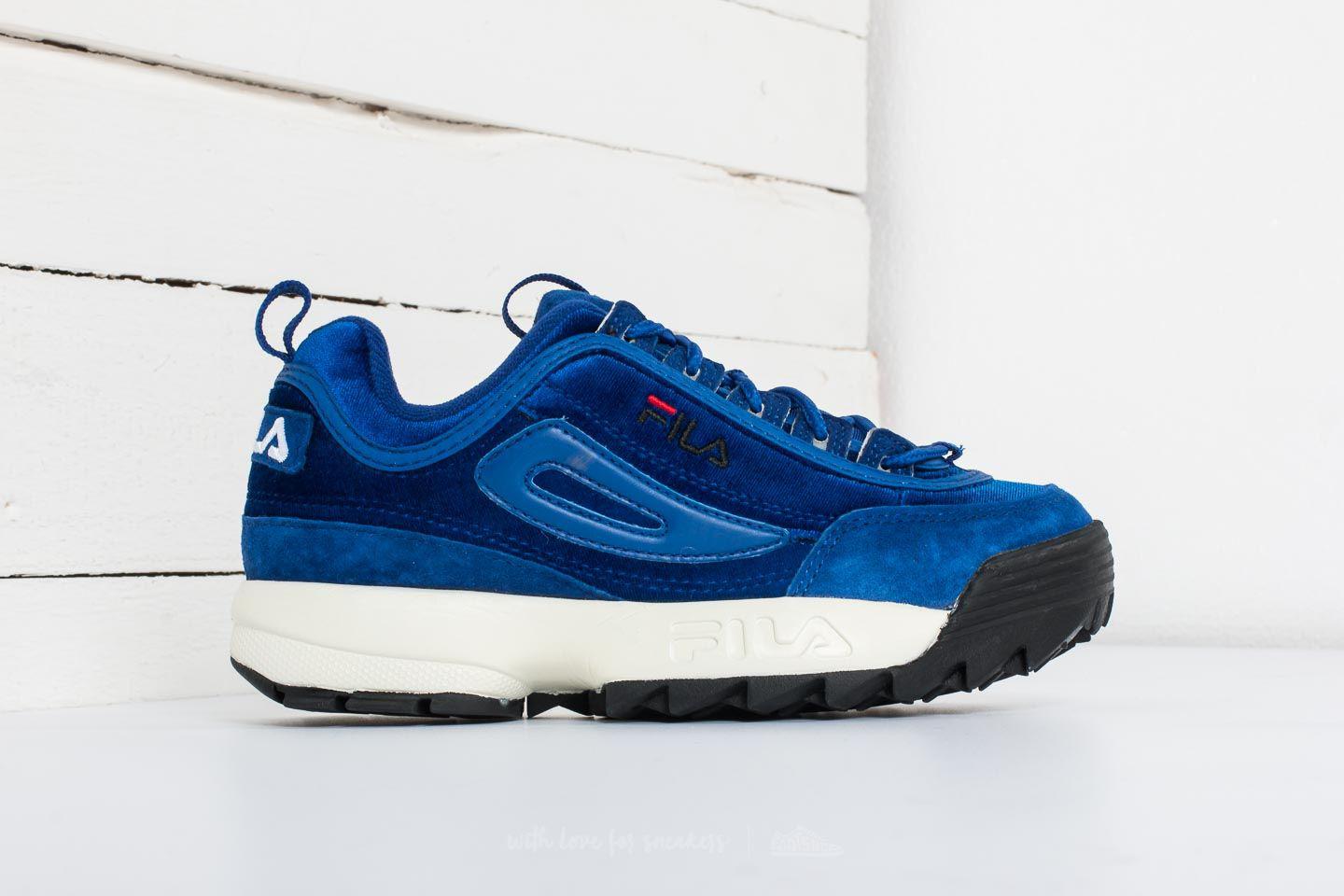 blue and white fila disruptor