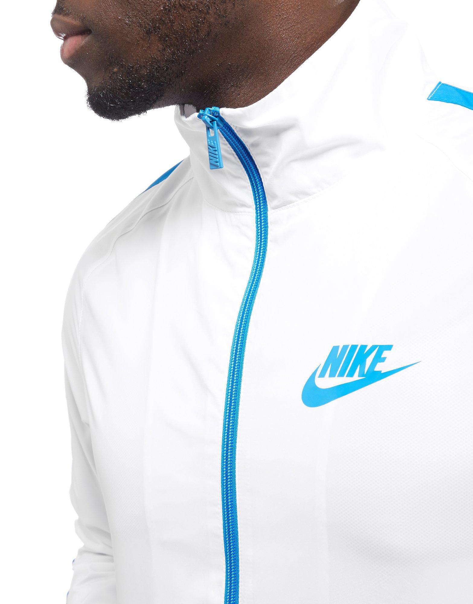 nike tech tracksuit light blue