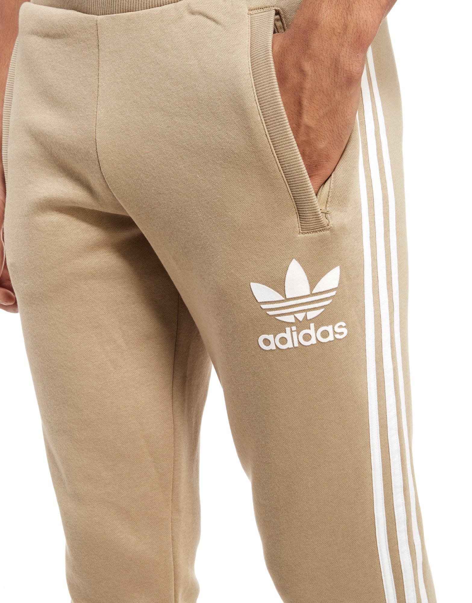 adidas track pants too long