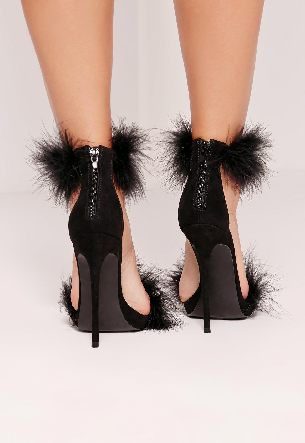 black high heels with feathers