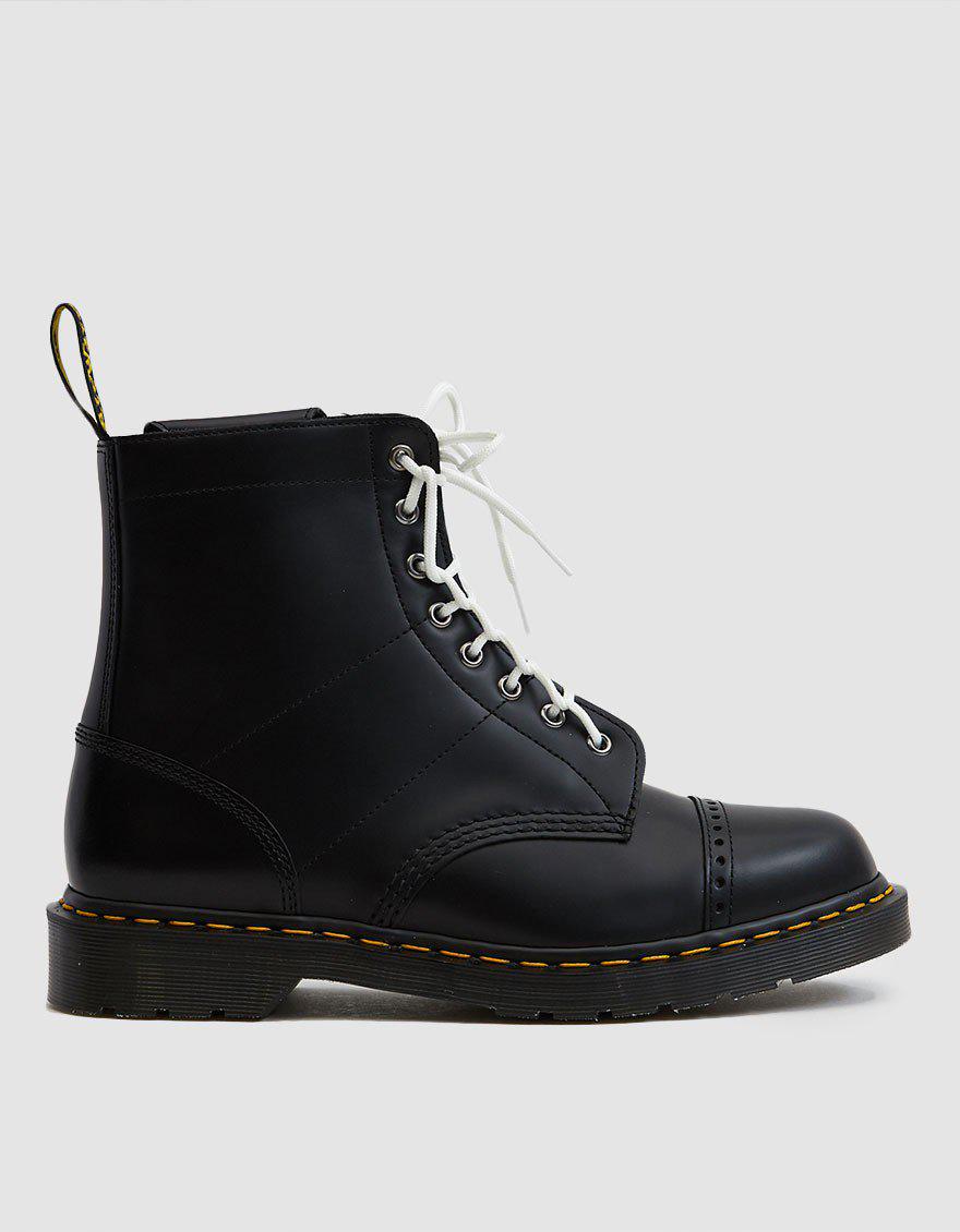 black boots with white laces