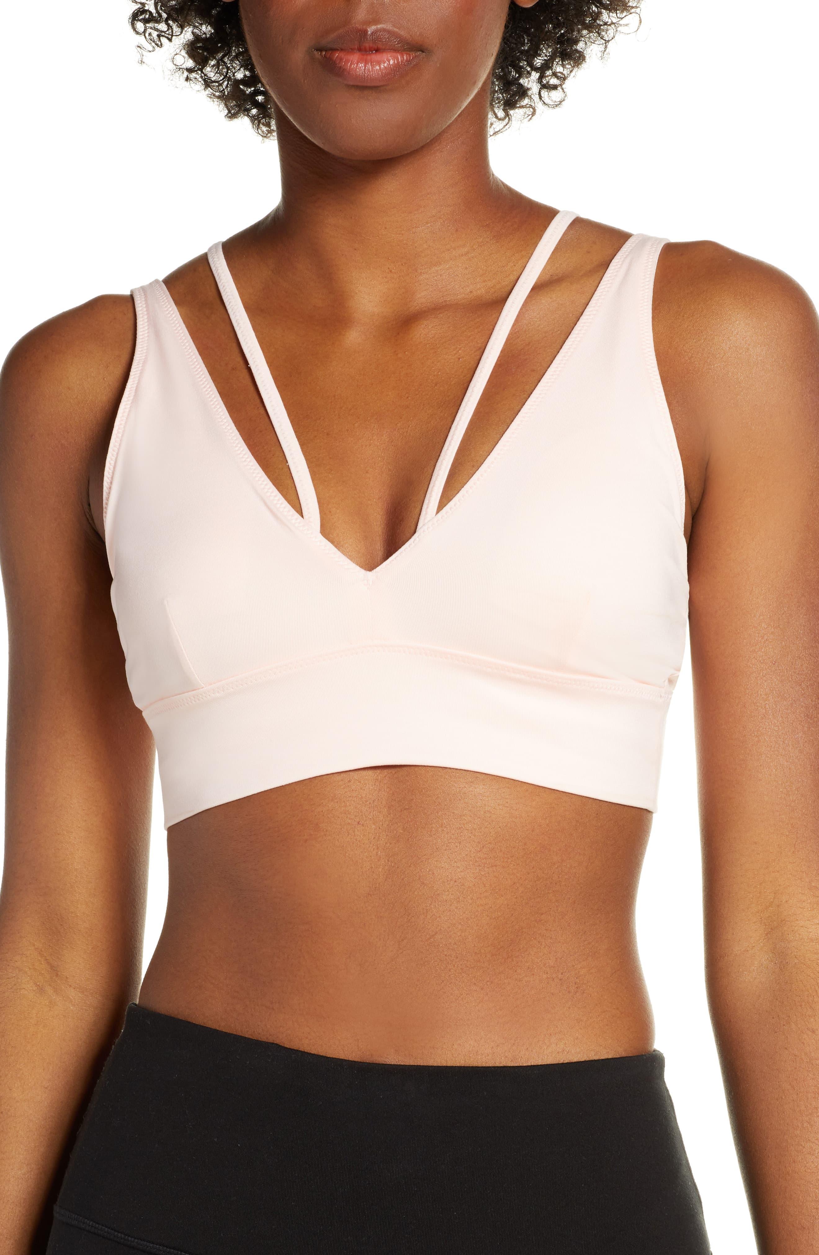 New Balance Evolve Strappy Sports Bra - Lyst