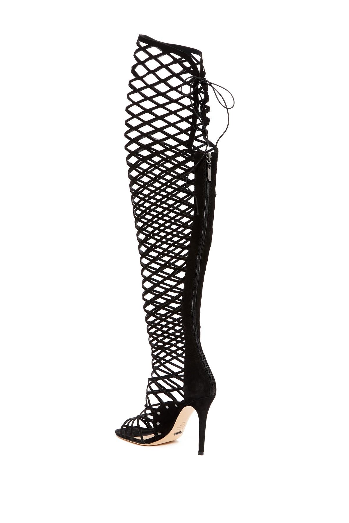 caged thigh high boots