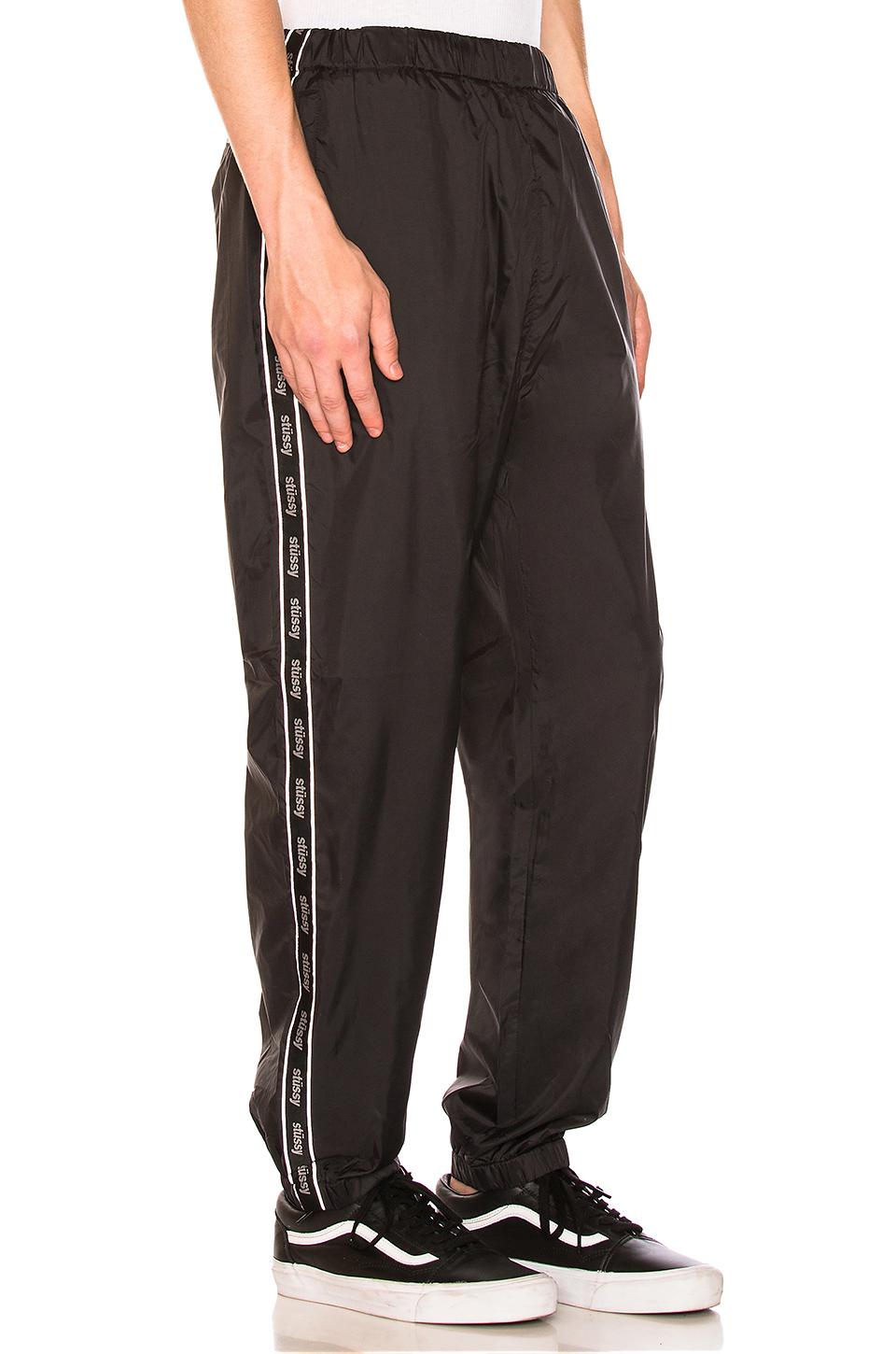 stussy black track pants