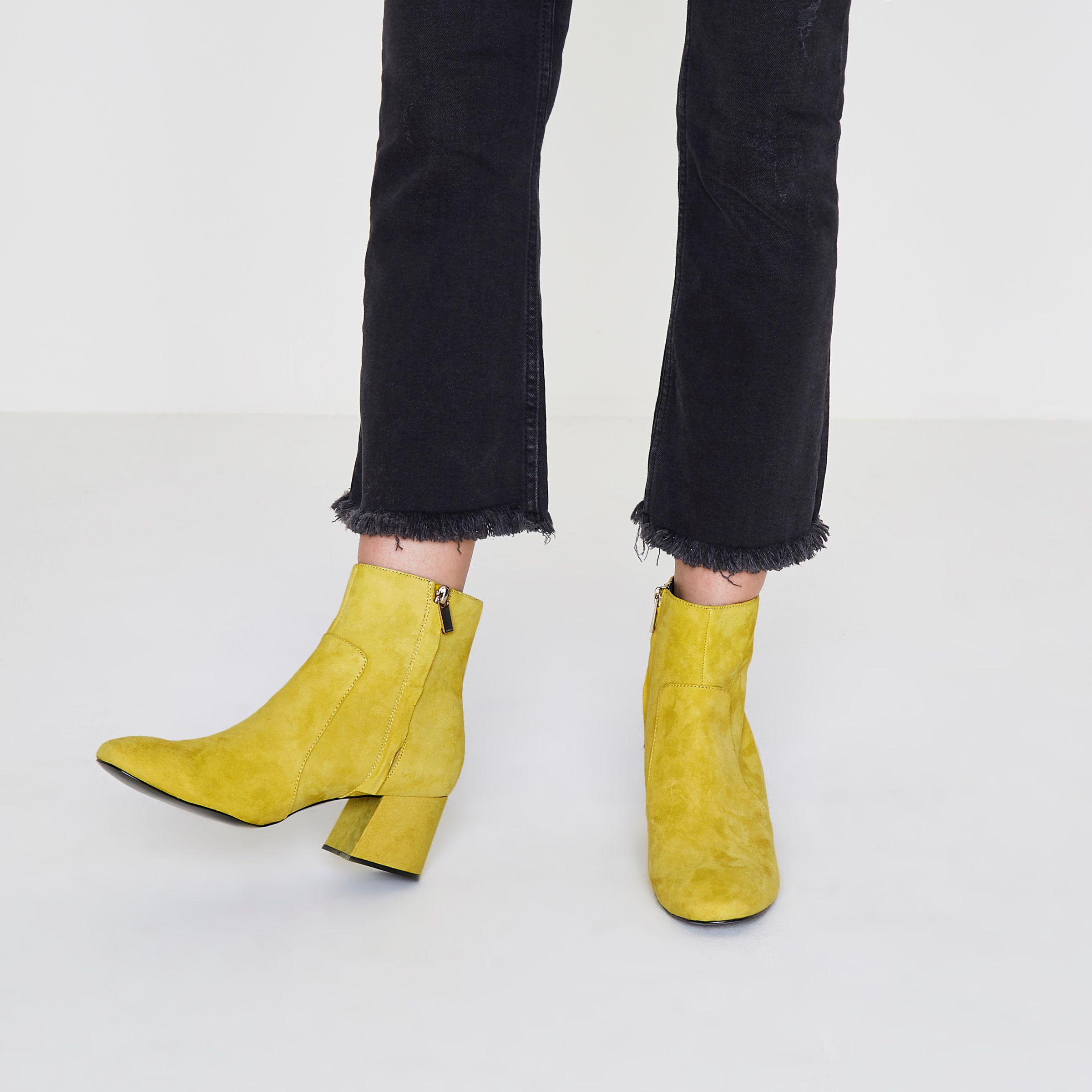 yellow block heel boots