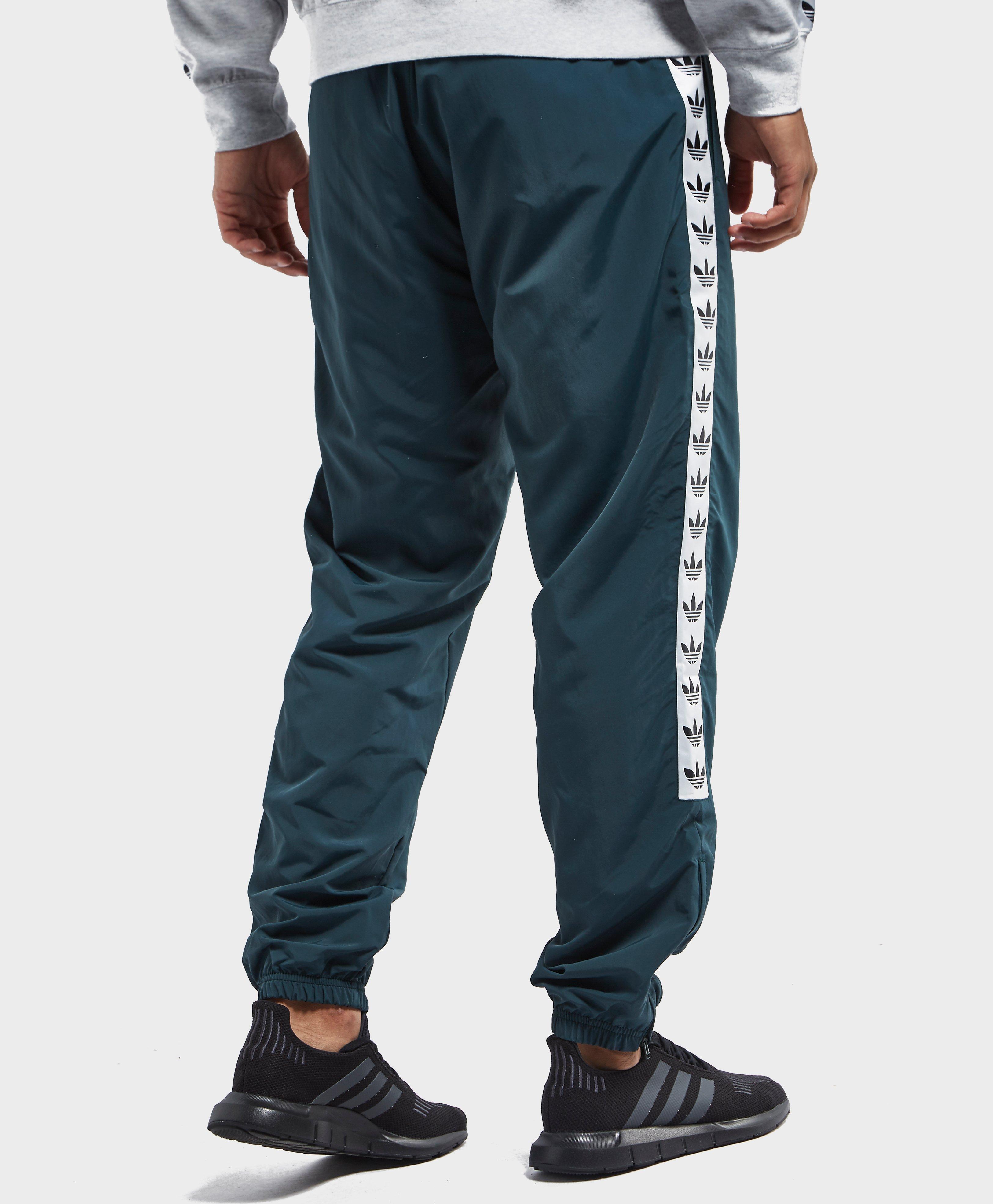 tape poly track pants