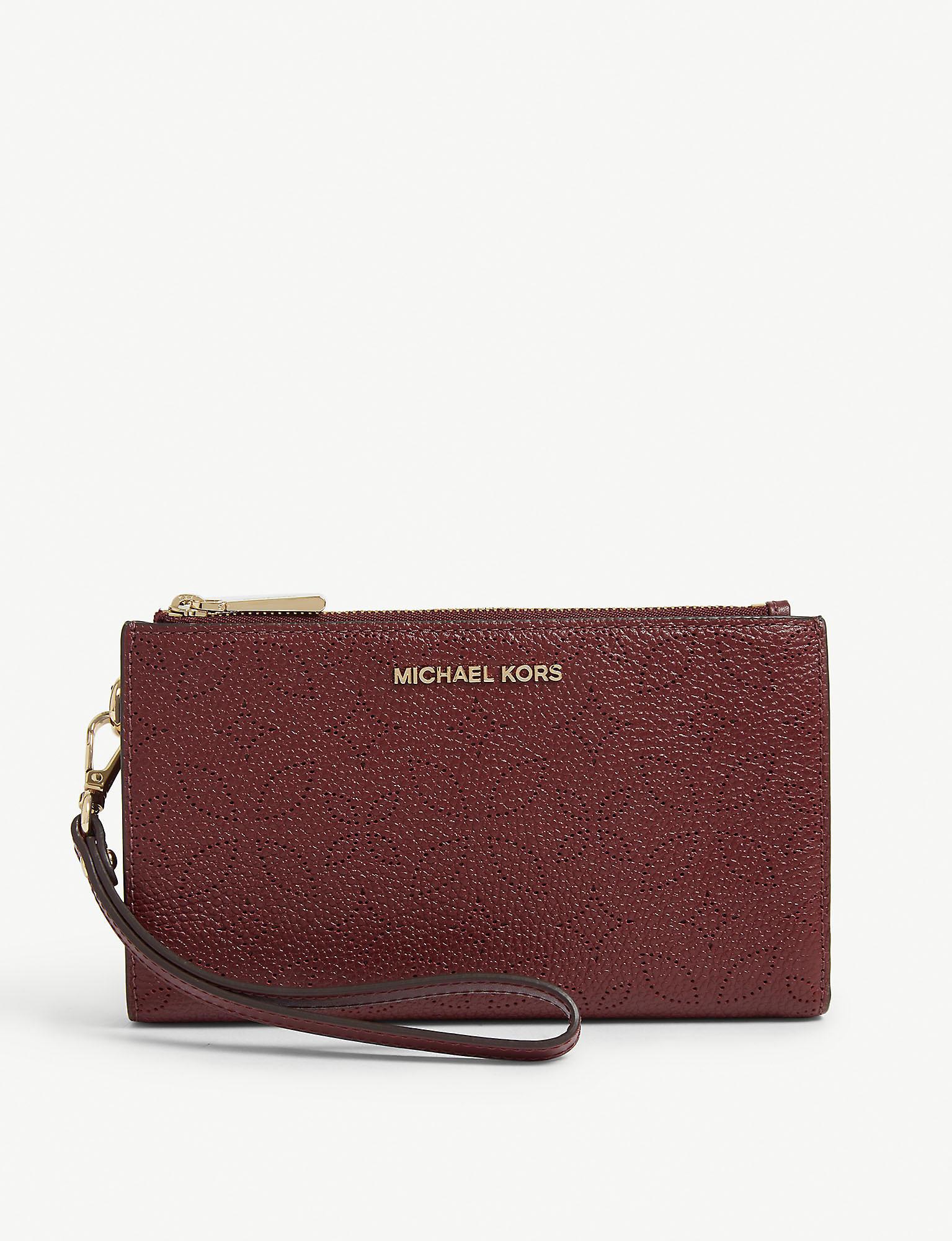 MICHAEL Michael Kors Floral Pattern Leather Wristlet in Red - Lyst
