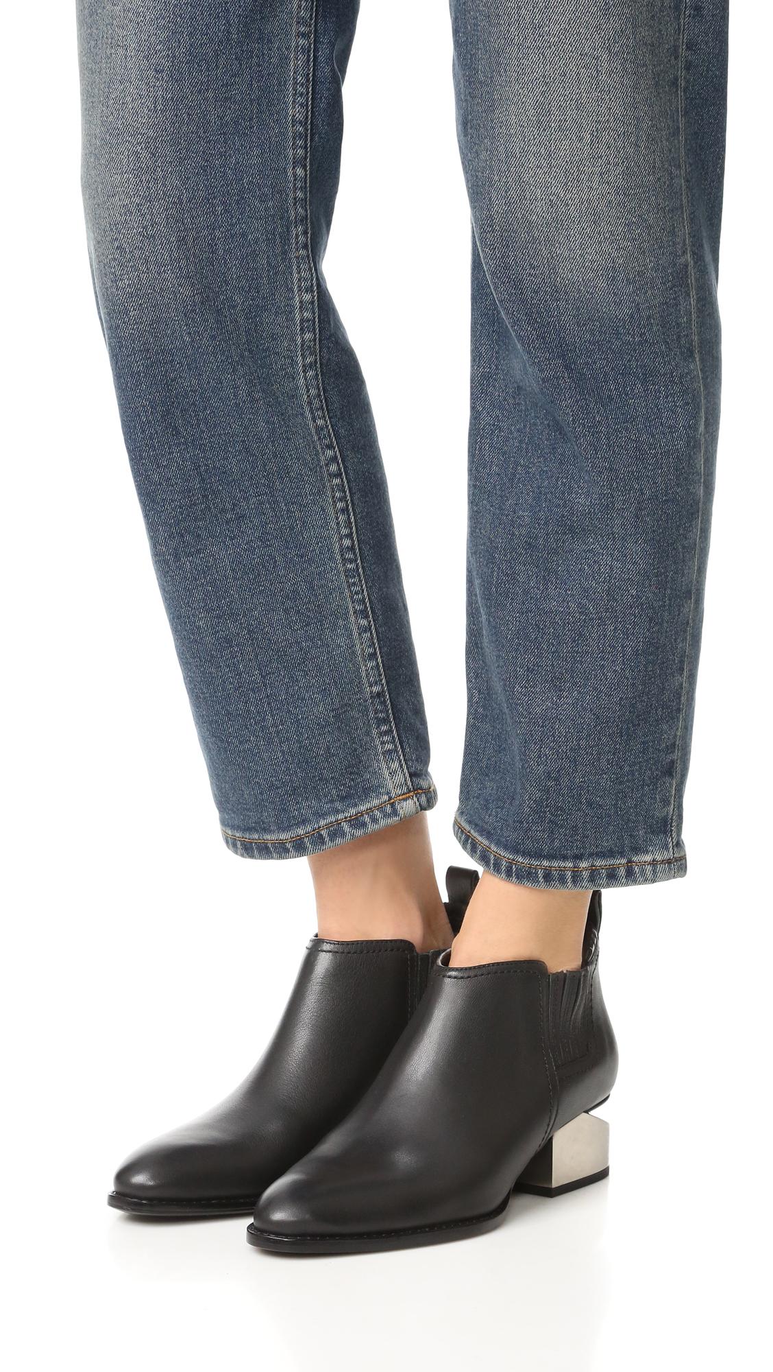 black booties with silver hardware