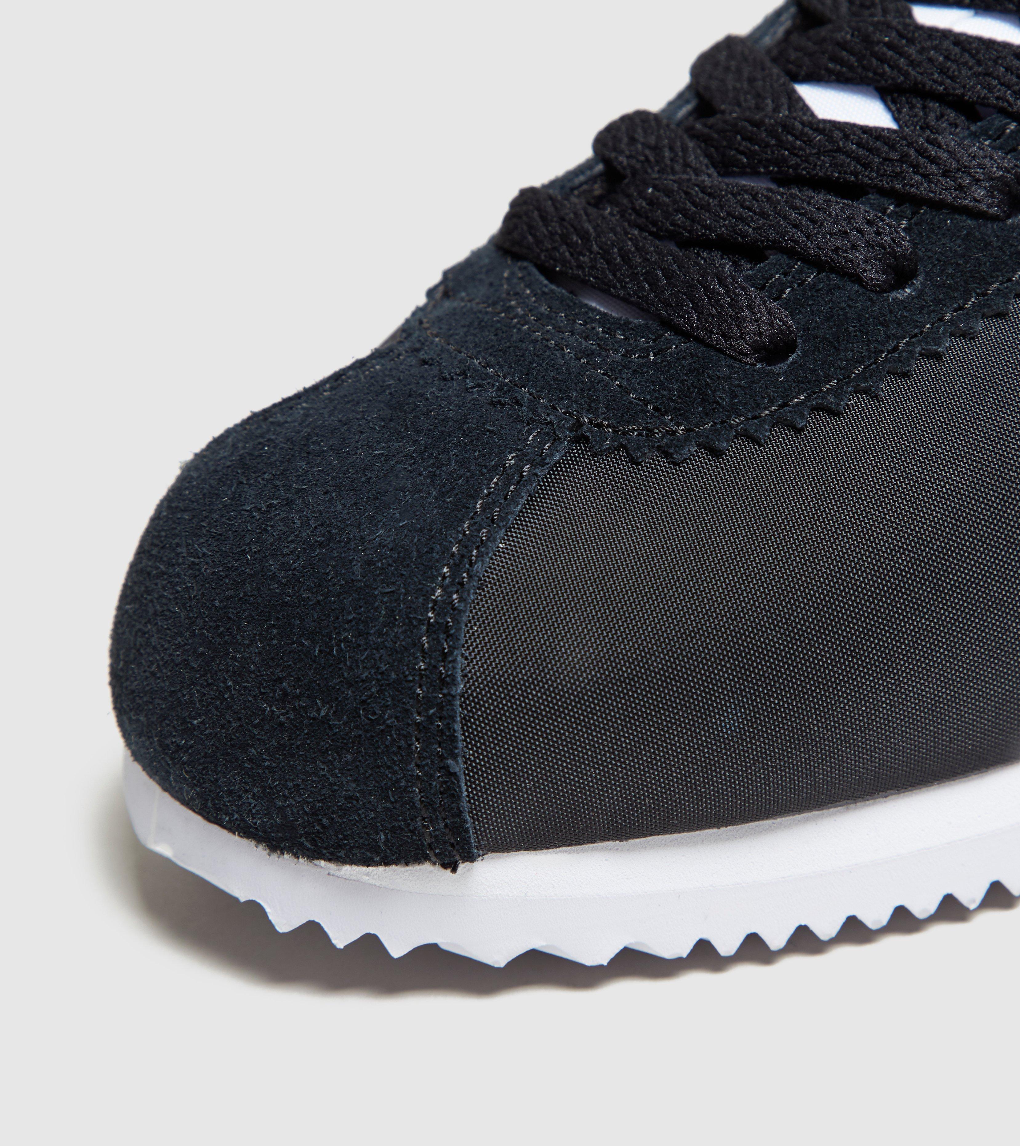 nike black cortez womens