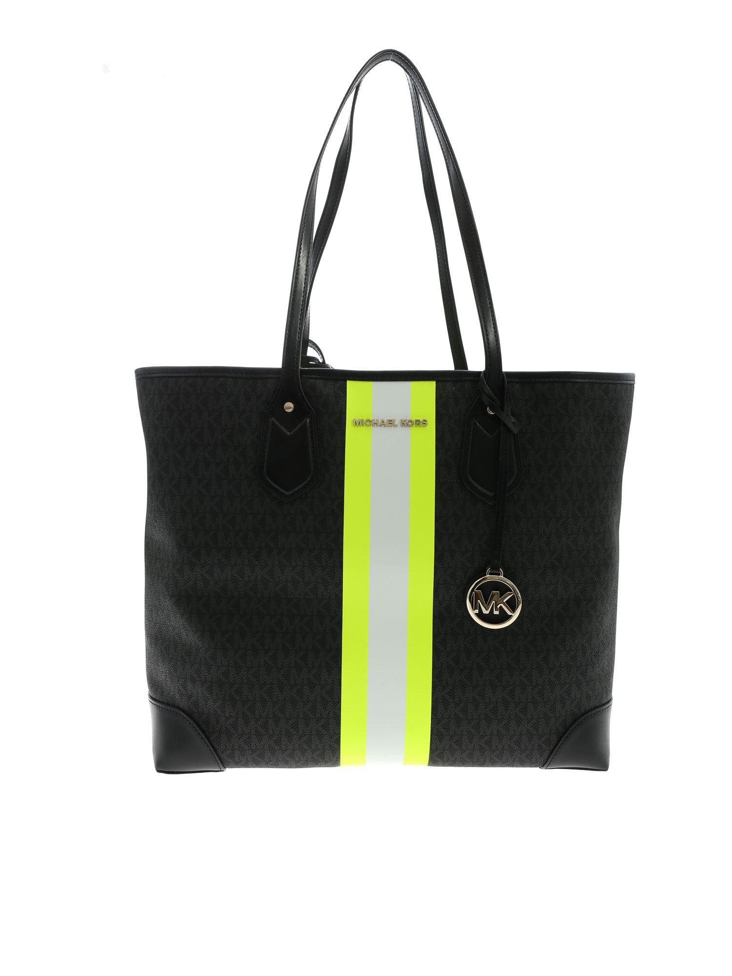 Michael Kors Leather Lg Tote Eva Bag In Black And Neon Yellow - Lyst