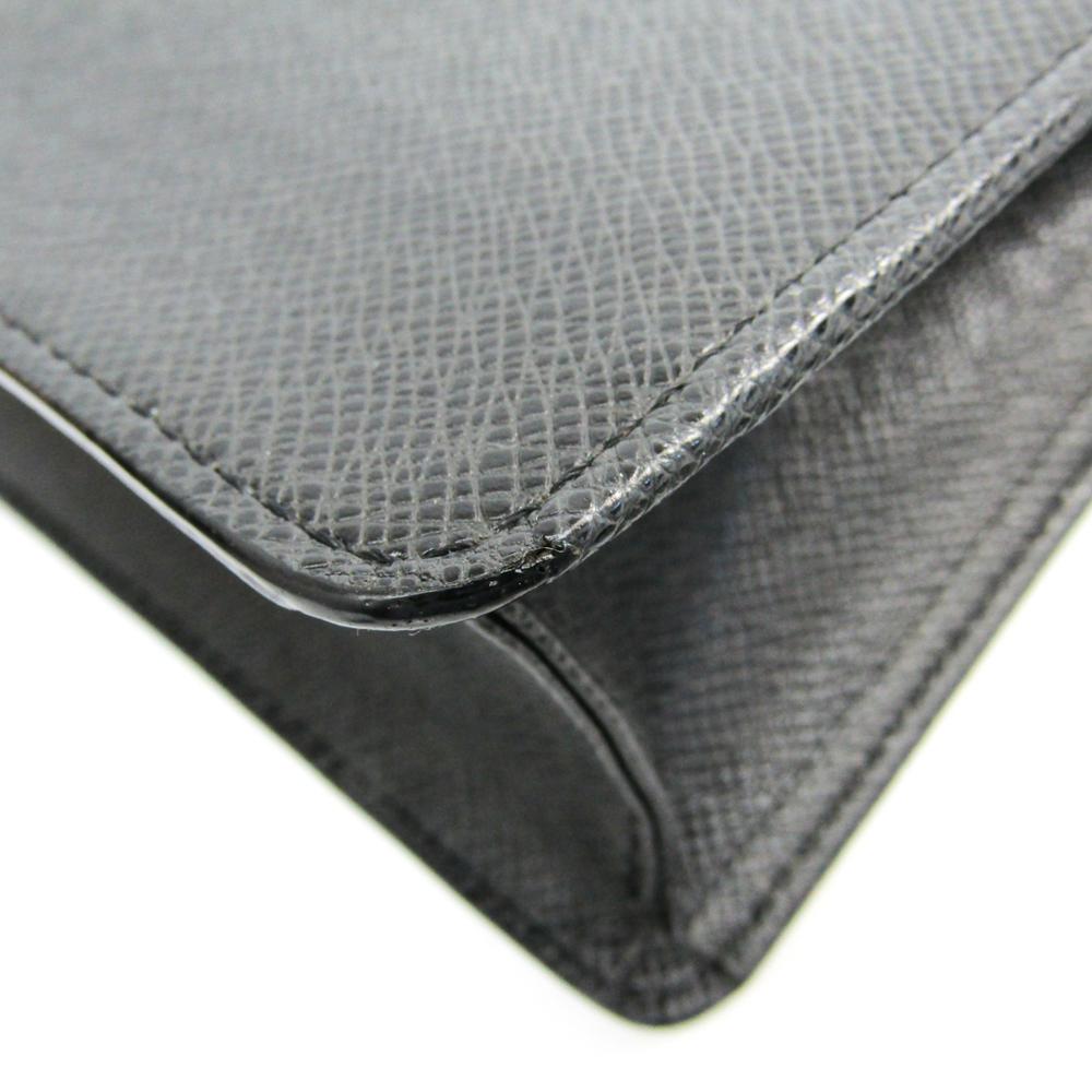 Louis Vuitton Brazza Wallet Taiga Leather - ShopStyle