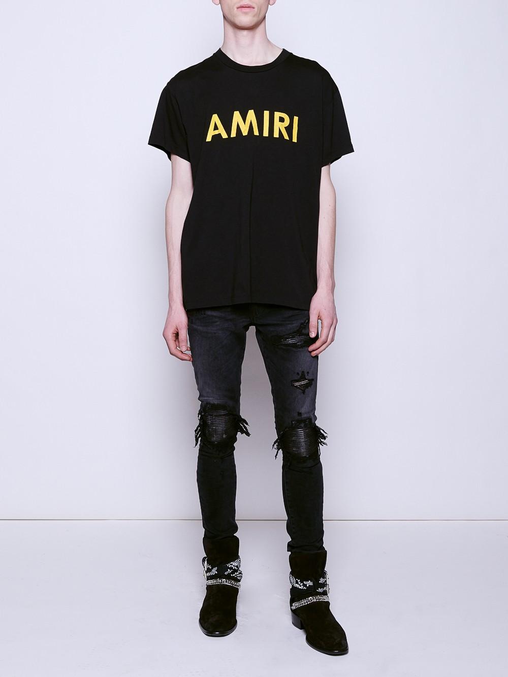 amiri black patch jeans