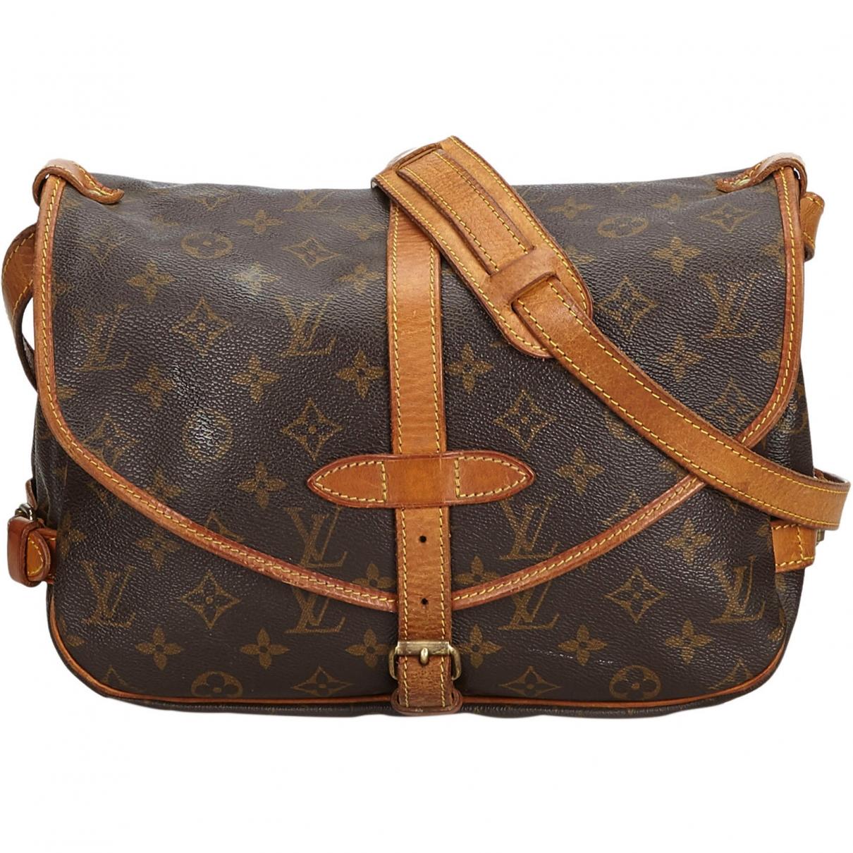 Lyst - Louis Vuitton Saumur Cloth Handbag in Brown