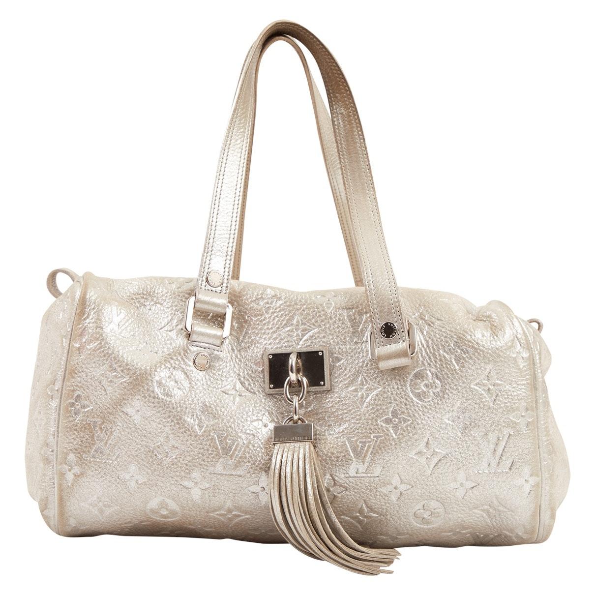 Louis Vuitton Silver Leather Handbag in Metallic - Lyst