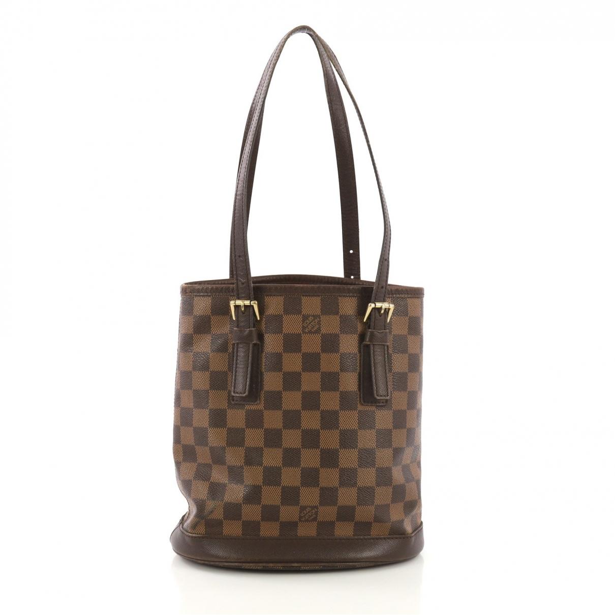 Louis Vuitton Pre-owned Bucket Brown Cloth Handbags in Brown - Save 12% - Lyst