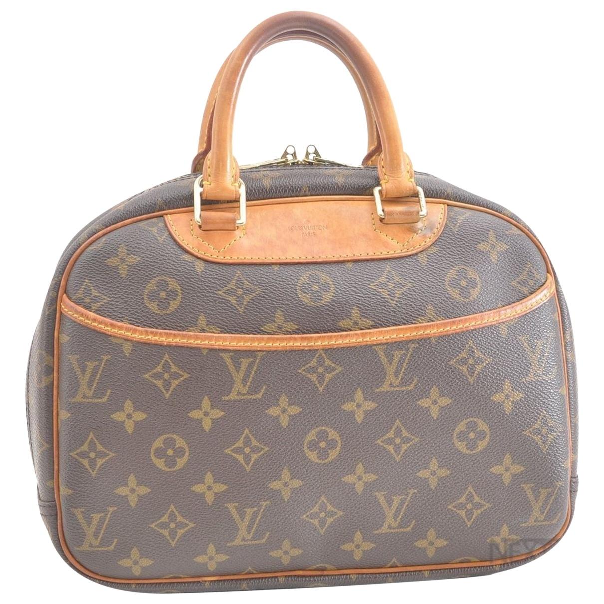 Lyst - Louis Vuitton Trouville Brown Cloth Handbag in Brown