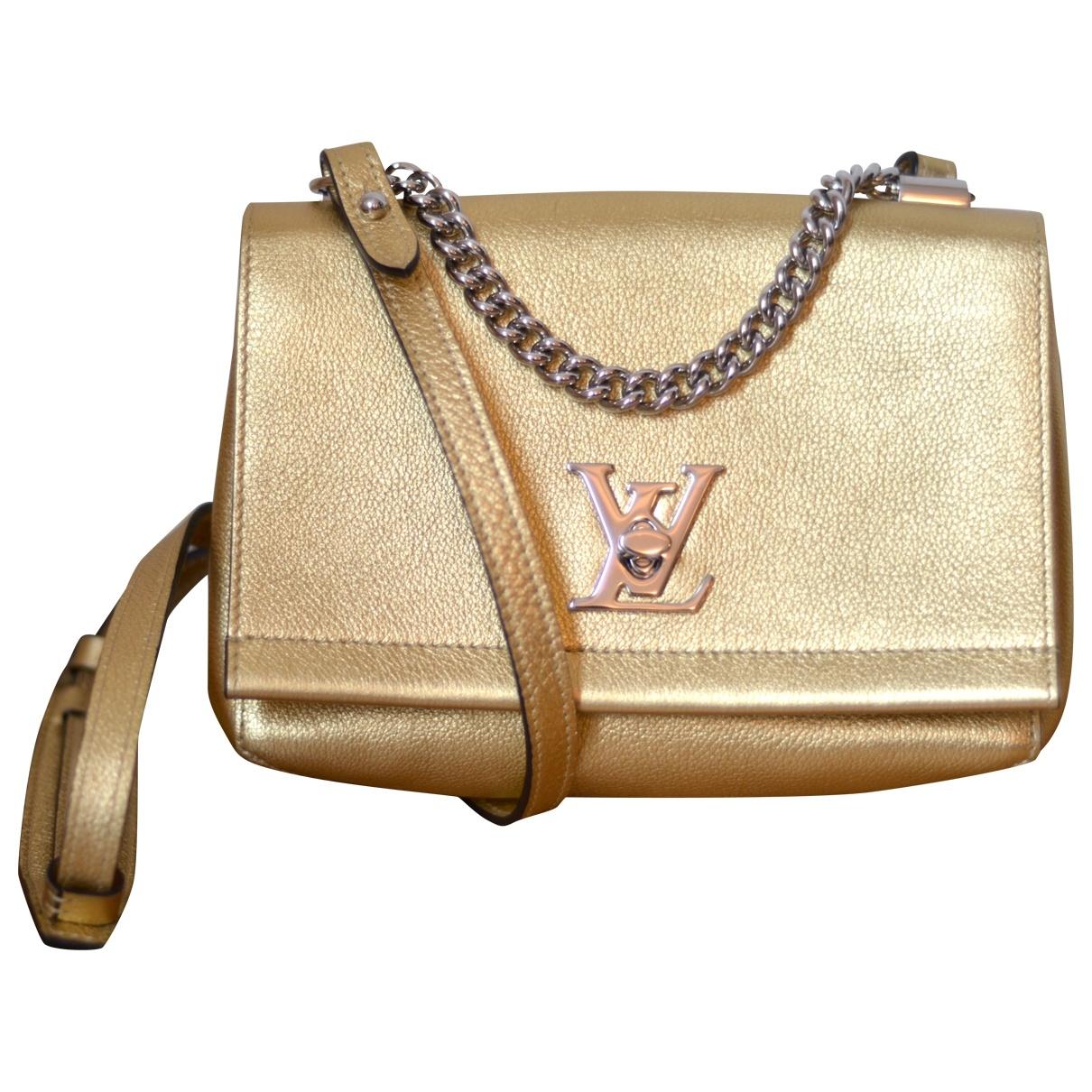Louis Vuitton Mylockme Gold Leather Handbag in Metallic - Lyst