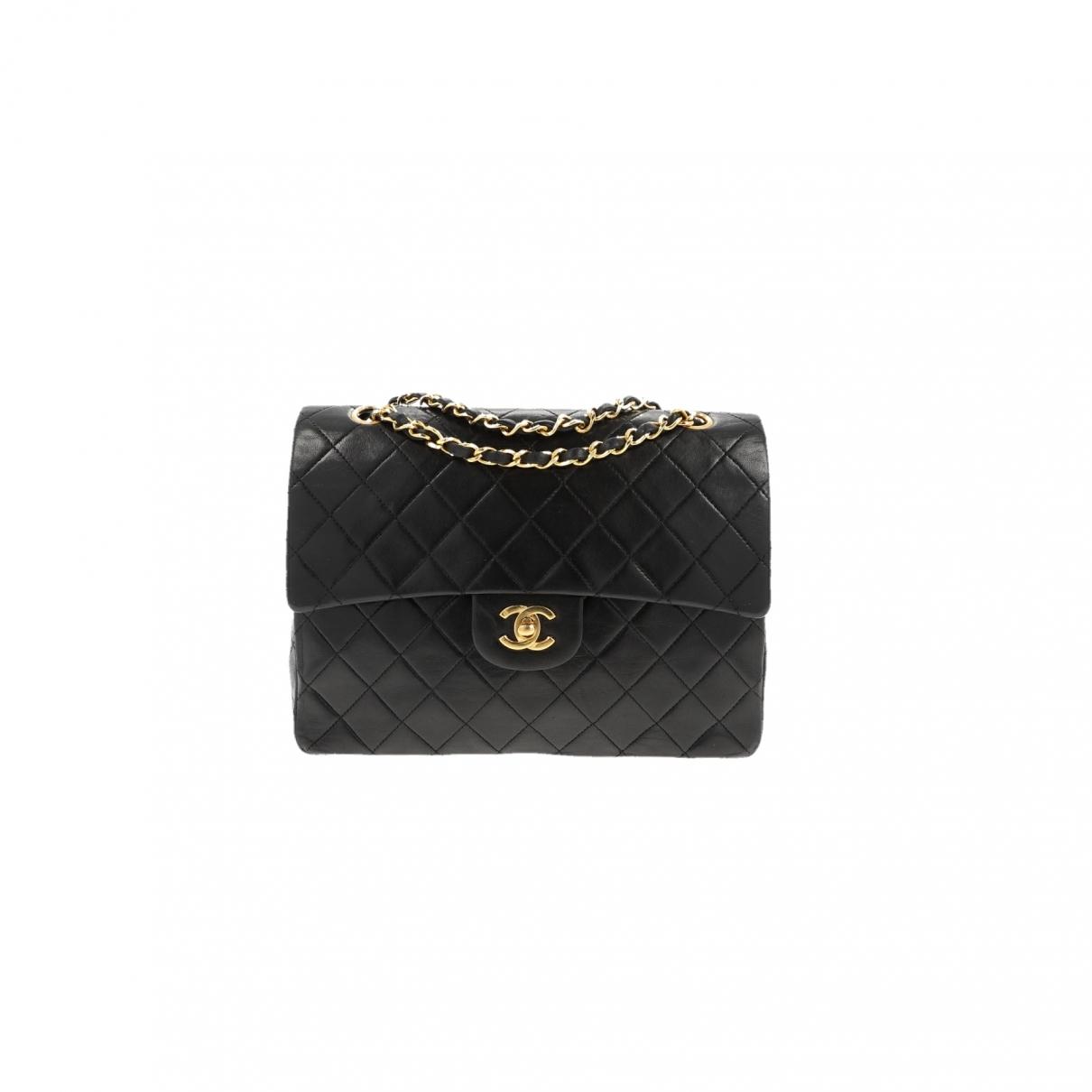 Chanel Pre-owned Timeless/classique Black Leather Handbags in Black - Lyst