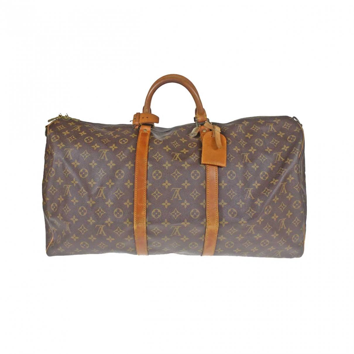 Louis Vuitton Vintage Keepall Brown Cloth Travel Bag in Brown - Lyst