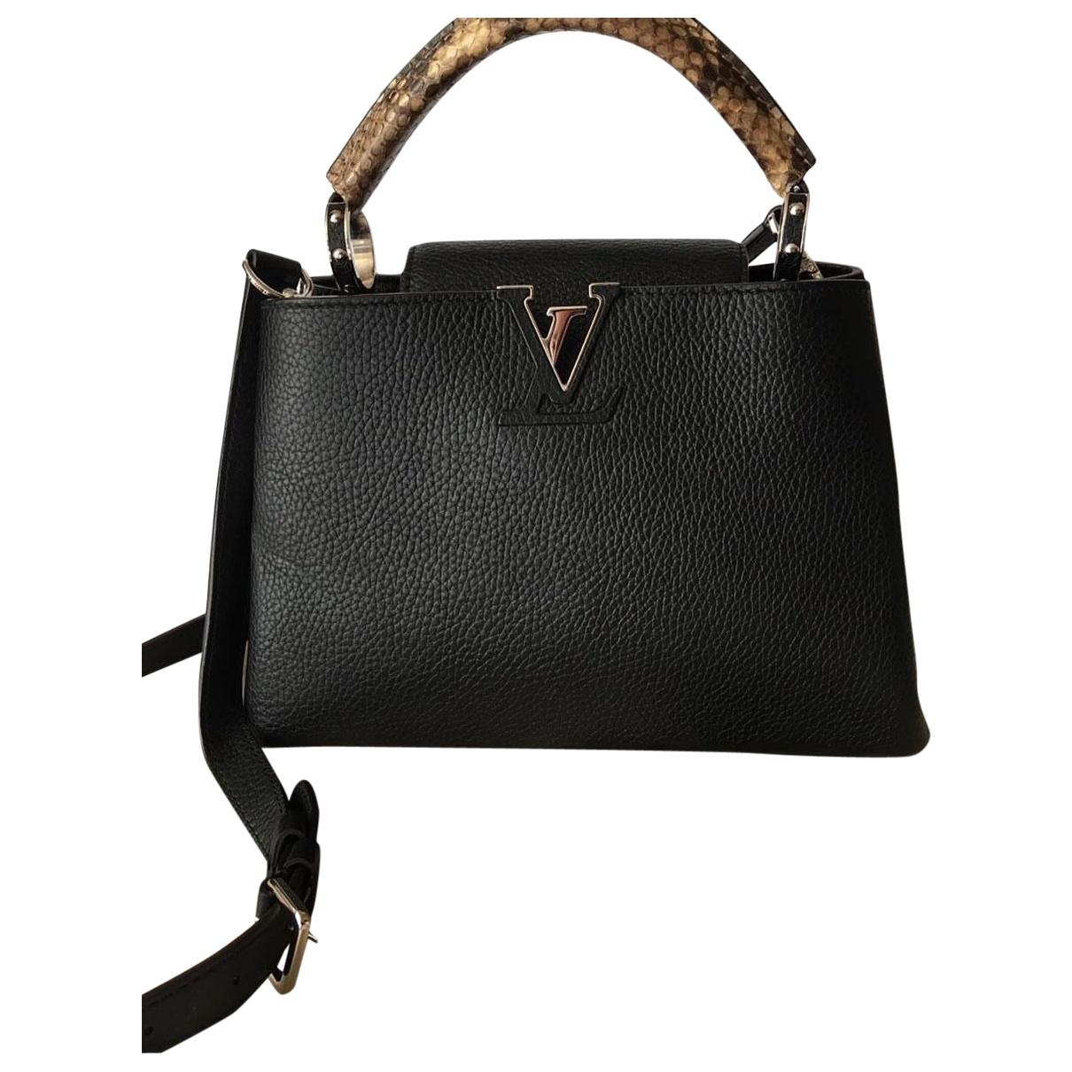 Louis Vuitton Capucines Black Leather Handbag in Black - Lyst