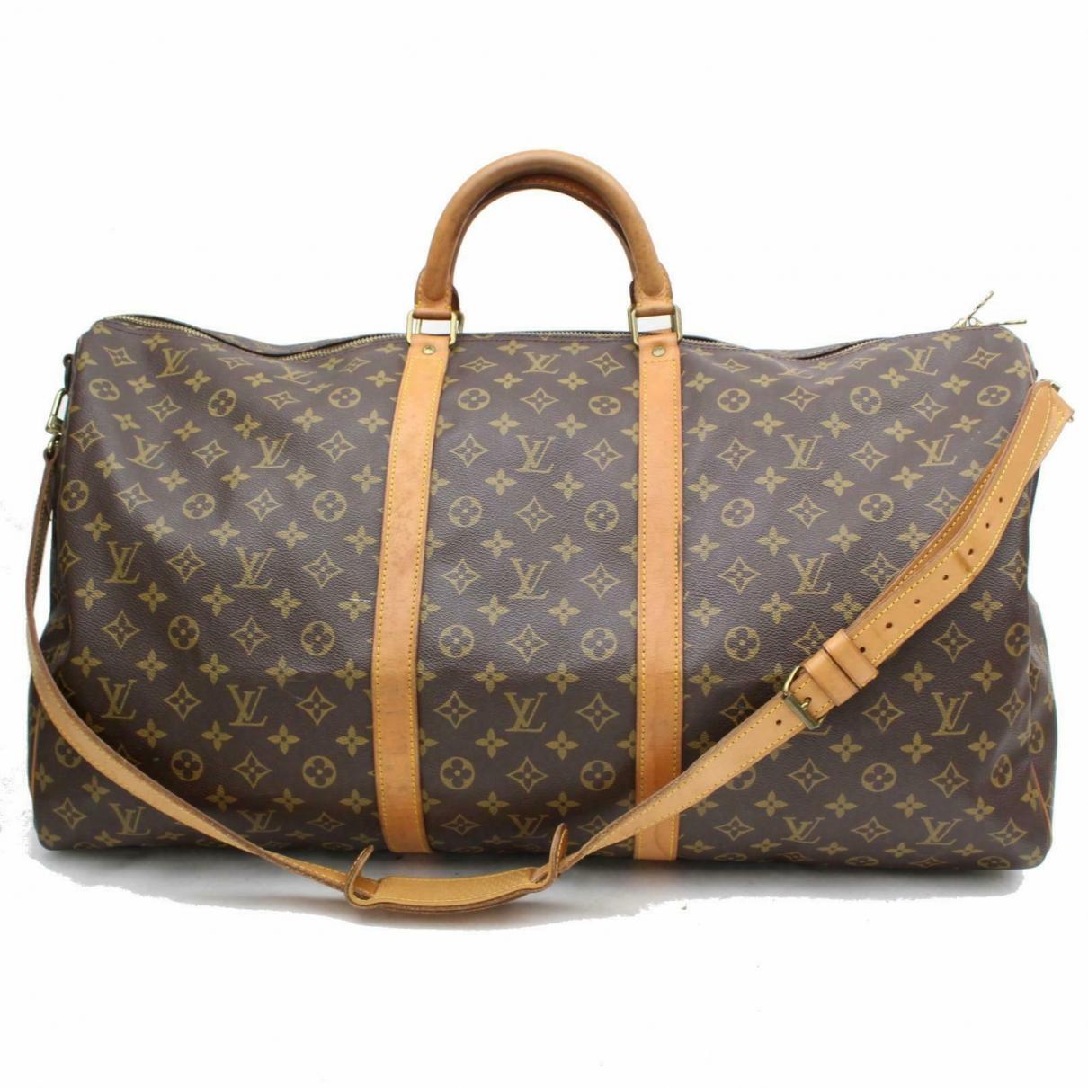Louis Vuitton Pre-owned Keepall Brown Cloth Travel Bags in Brown - Lyst